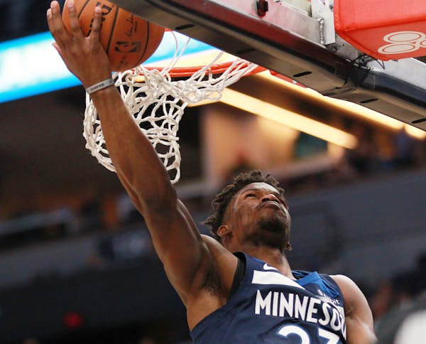 The Timberwolves Jimmy Butler shoots against the Los Angeles Clippers in the first quarter Sunday.
