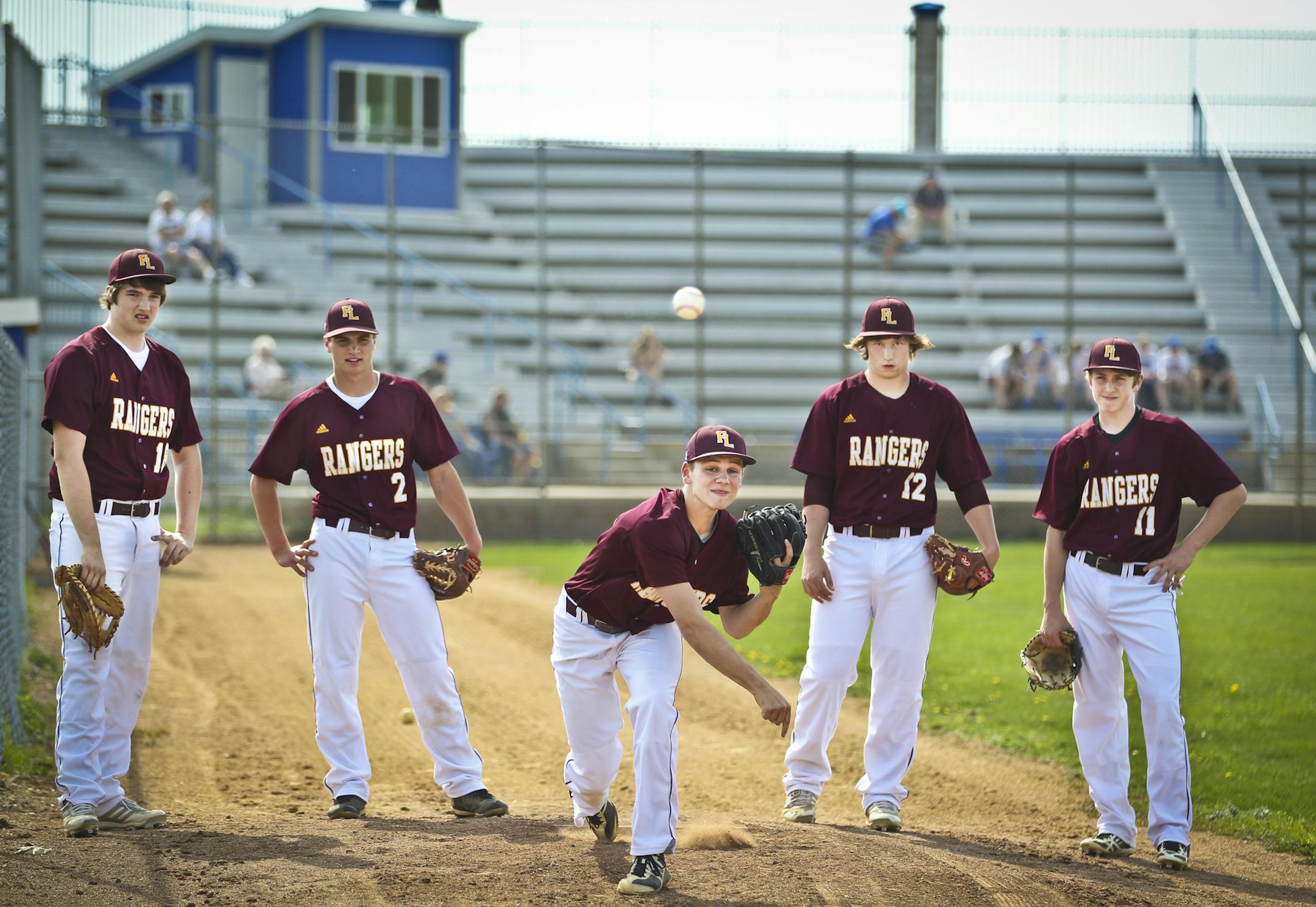 None of these Forest Lake players (from left) — Joey Vacinek, Reid Larson, Dylan Dresel, Clayton Dahly and Brett Gravelle — expected to do much pitching this spring. But with inclement weather and games piling up, they’ve all taken their turns on the mound to help the Rangers to the top of the Suburban East Conference.