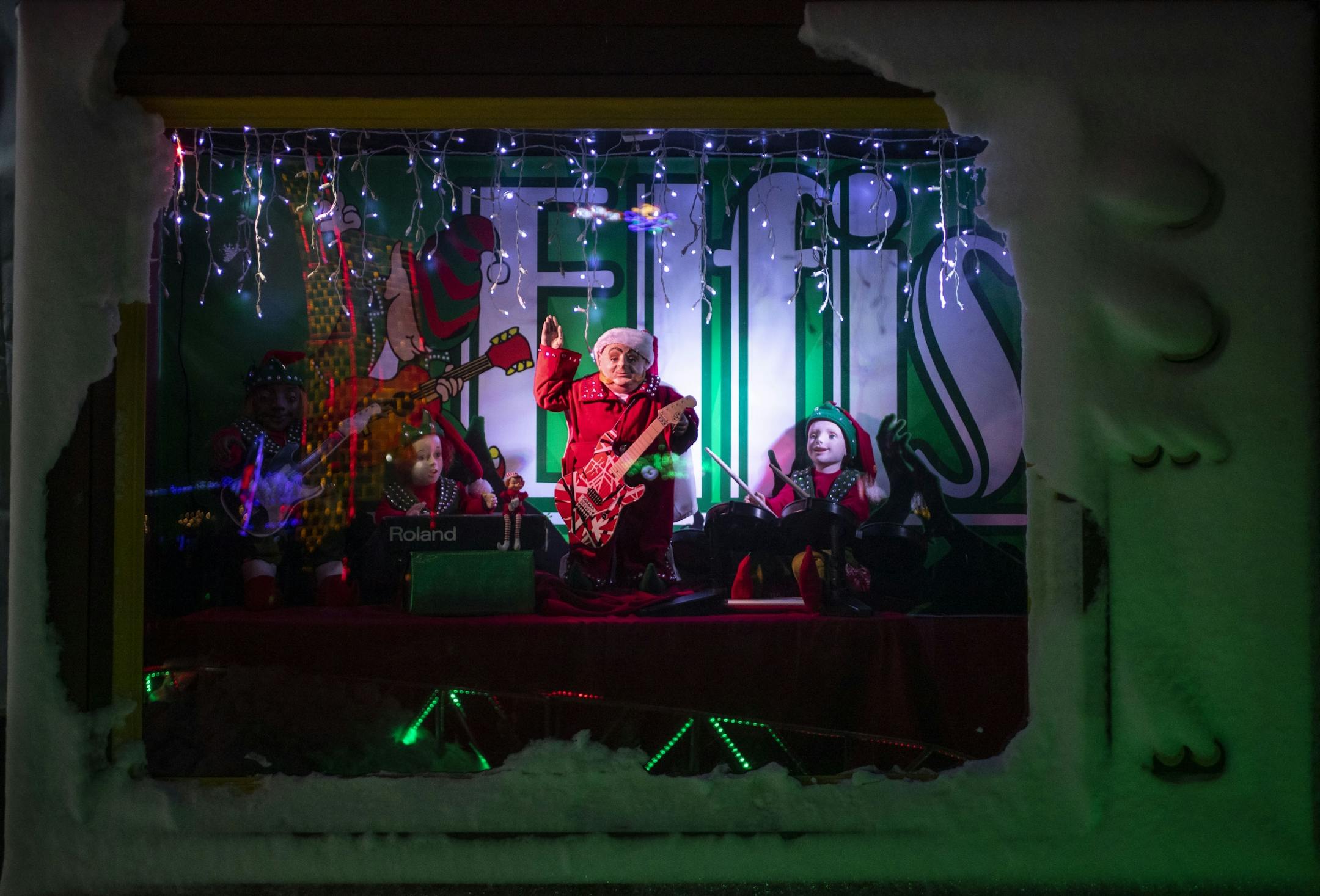 An animatronic "Elfis" holding a guitar was on display in a faux TV set in Bentleyville on Friday December 6, 2019.