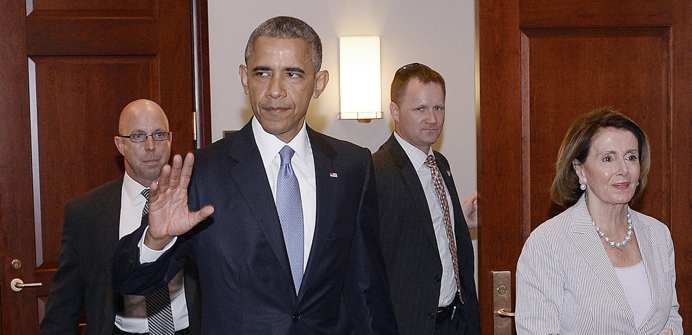 President Barack Obama and House Minority Leader Nancy Pelosi, right, leave the Gabriel Zimmerman room after a meeting with members of the House Democratic caucus to discuss his trade agenda on Capitol Hill in Washington, D.C., on Friday, June 12, 2015. (Olivier Douliery/Abaca Press/TNS) ORG XMIT: 1169392 ORG XMIT: MIN1506121248381026