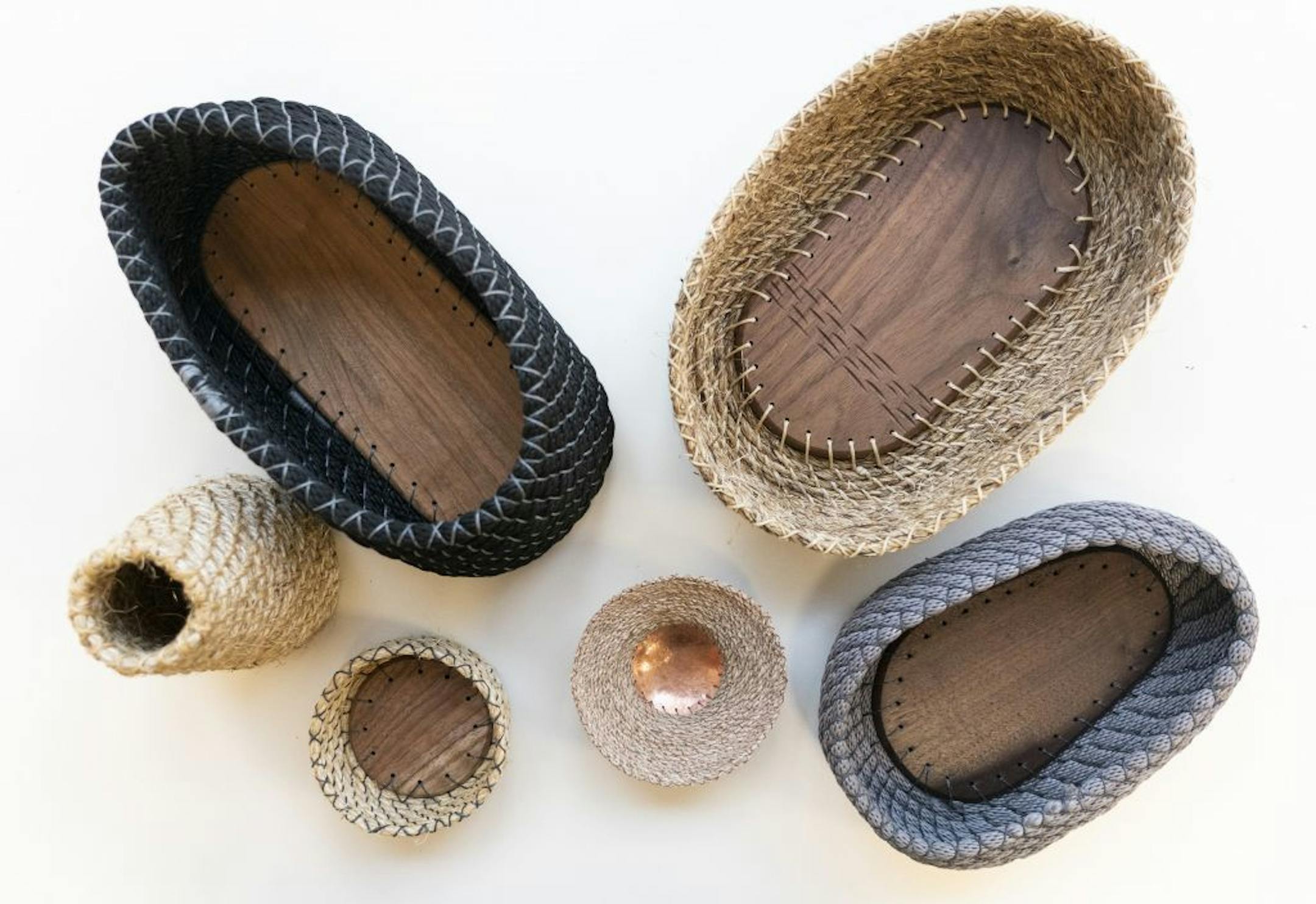 These coiled rope baskets by Teresa Audet range in price from $25 to $375, and include flourishes such as wood and copper bottoms.