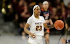 Senior guard Kenisha Bell (shown in a game earlier this season vs. Illinois) scored 14 of her game-high 25 points in the first half Thursday to help s
