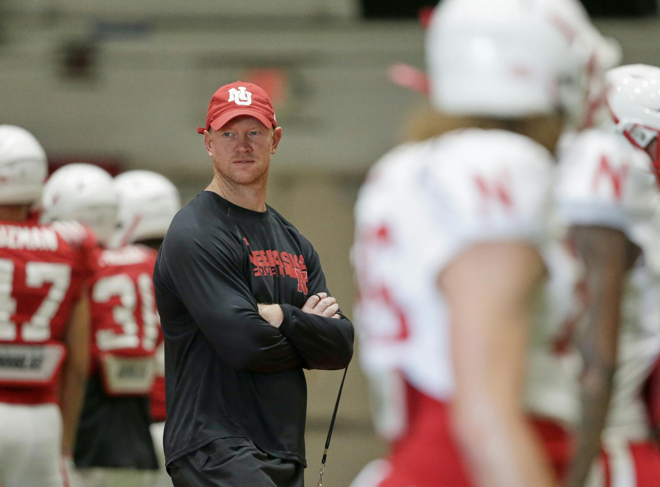 Nebraska head coach Scott Frost follows NCAA college football preseason practice in Lincoln, Neb., Wednesday, Aug. 14, 2019. (AP Photo/Nati Harnik) ORG XMIT: NENH1