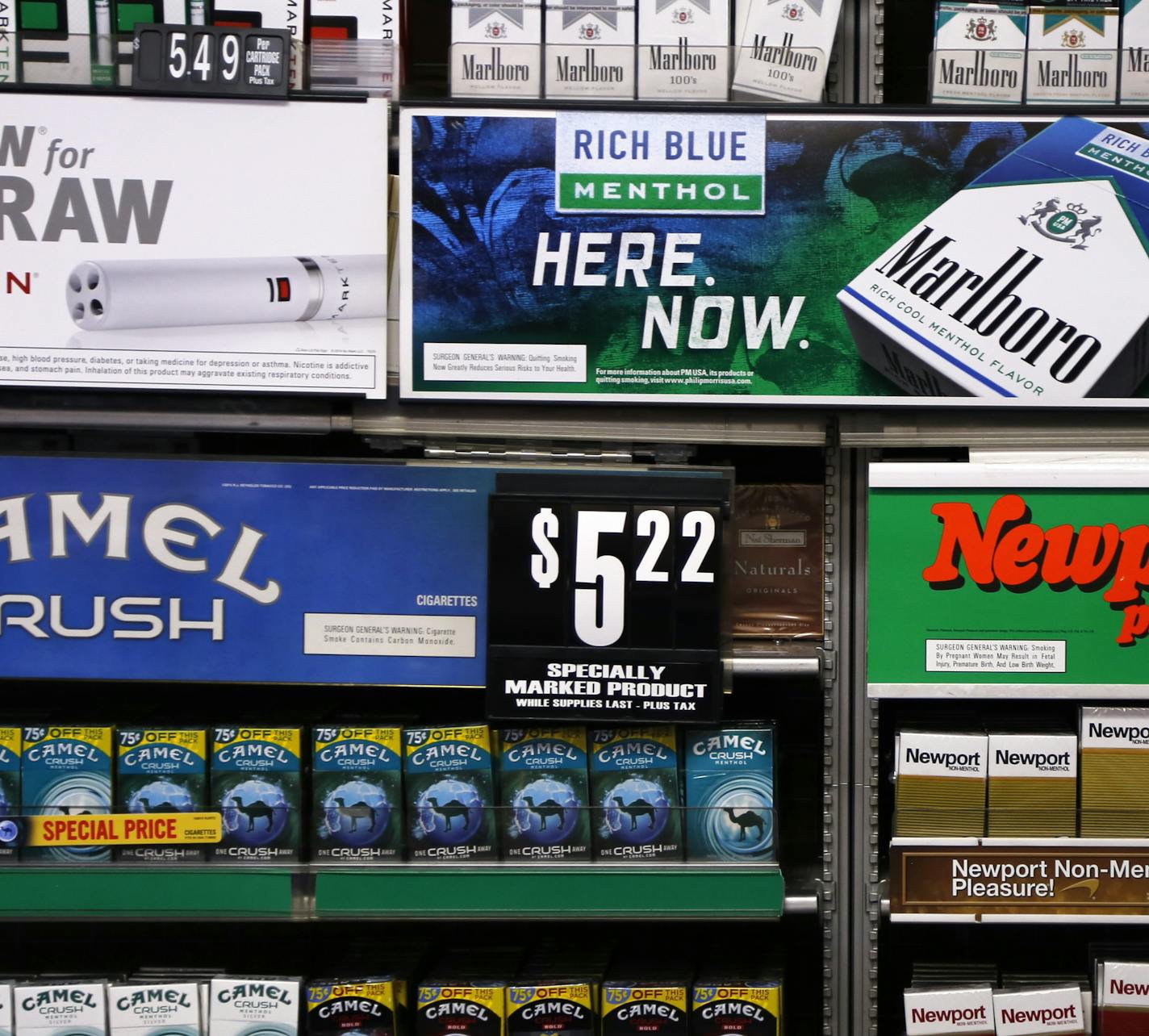 FILE - In this Friday, July 17, 2015 file photo, Camel and Newport cigarettes, both Reynolds American brands, are on display at a Smoker Friendly shop in Pittsburgh. British American Tobacco offered Friday, Oct. 21 2016 to buy Reynolds American Inc. in a $47 billion cash-and-stock deal that would create the world&#xed;s largest publicly traded tobacco company and bring together brands like Camel, Dunhill, and Newport. The logic of the deal, analysts say, is to make up for a decline in the number