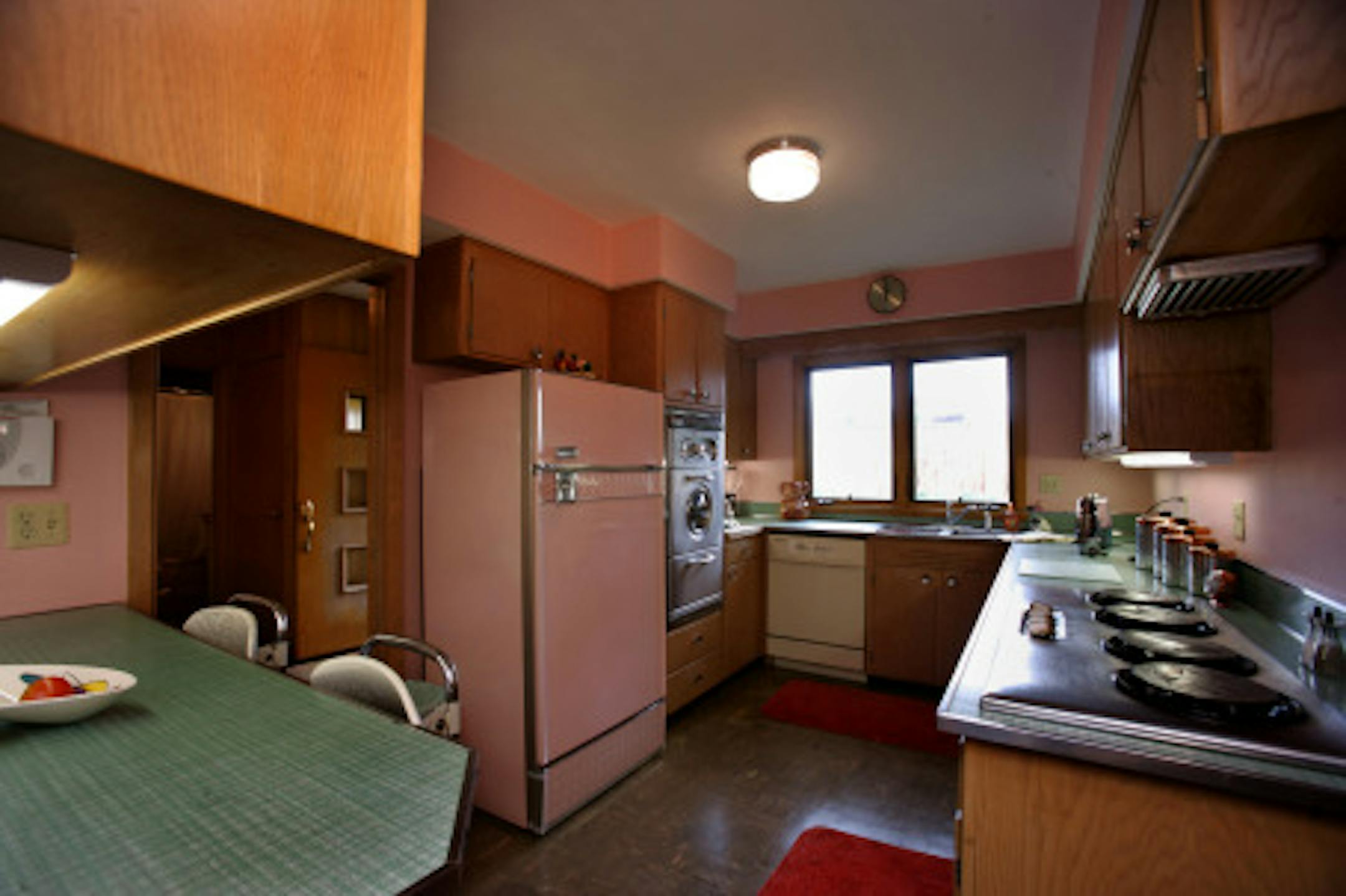joel koyama'jkoyama@startribune.com mod1011 20009651a]   SUNDAY HOMES COVER: Kitchen of Matt Rentsch and Jeff Ovik's rambler.  Matt Rentsch and Jeff Ovik bought the 1952 rambler and have creatively restored it to its original 1950s charm.They've furnished the house with back to the 50s vintage finds.  Shoot a portrait of Jeff and Matt in the home as well as details and an exterior.