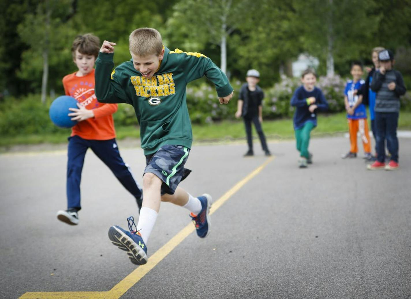 Will Ackerman ran safely back to third base as Eli Toht was trying to tag him out during a kickball game in recess at Lake Harriet Community School lower campus on Tuesday, May 30, 2017.