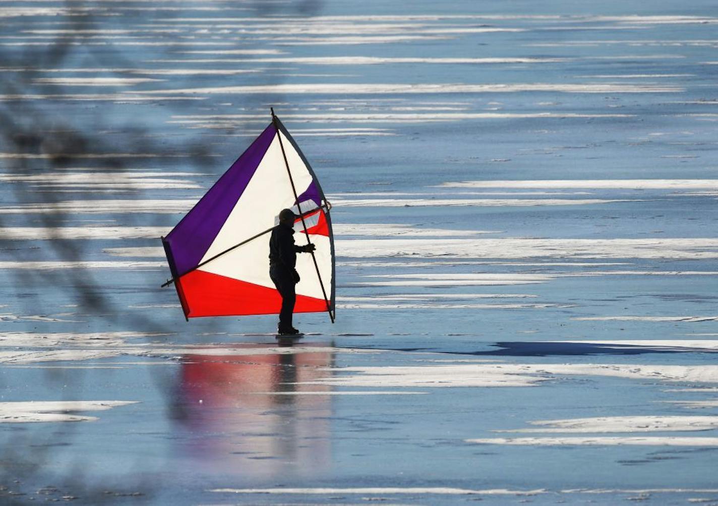 Warm weather brought a ice kiter to Bde Maka Ska as temp soared into the 40s Friday, January 4, 2019 in Minneapolis, MN.