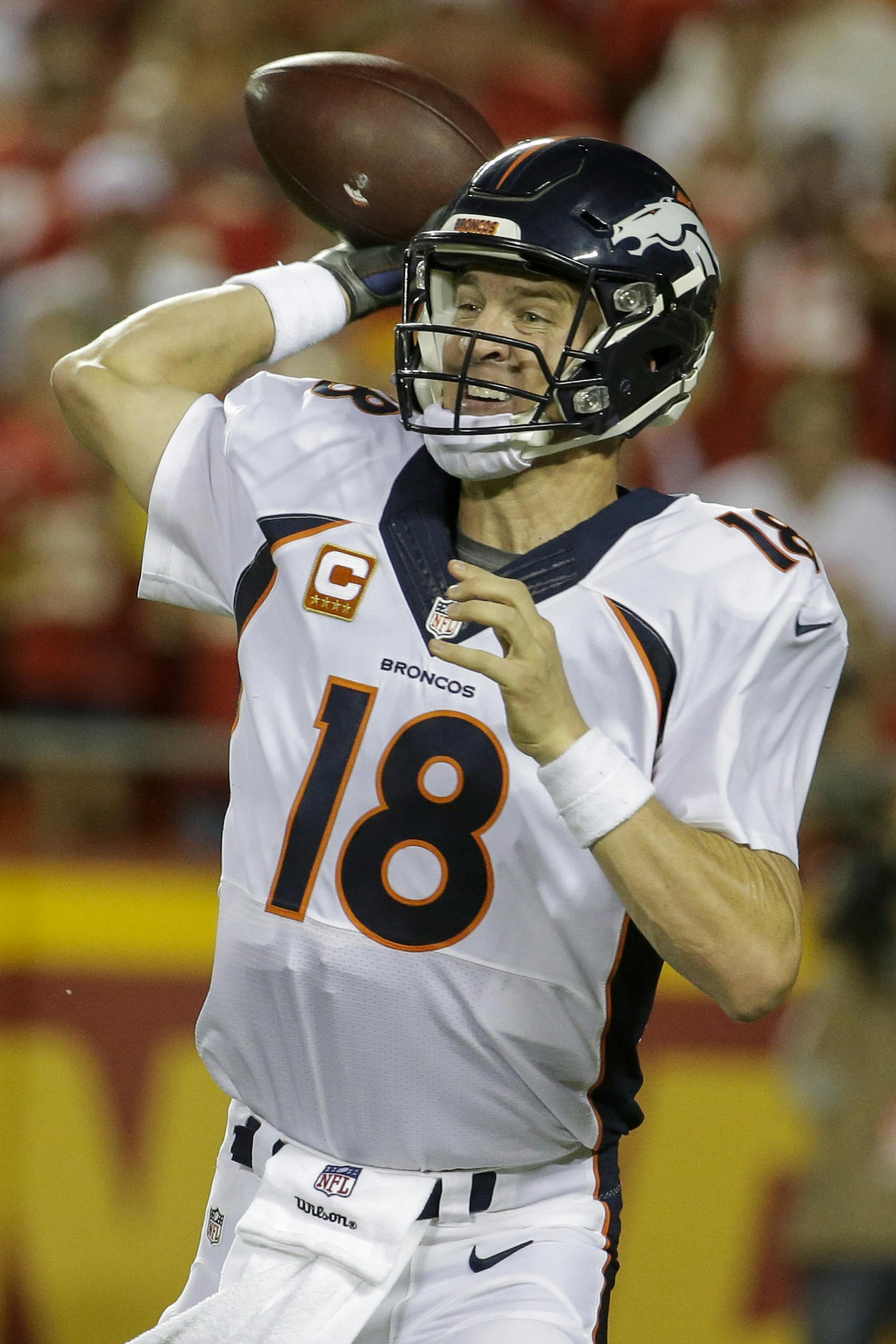 Denver Broncos quarterback Peyton Manning (18) throws during the first half of an NFL football game against the Kansas City Chiefs in Kansas City, Mo., Thursday, Sept. 17, 2015. (AP Photo/Charlie Riedel) ORG XMIT: MONH1