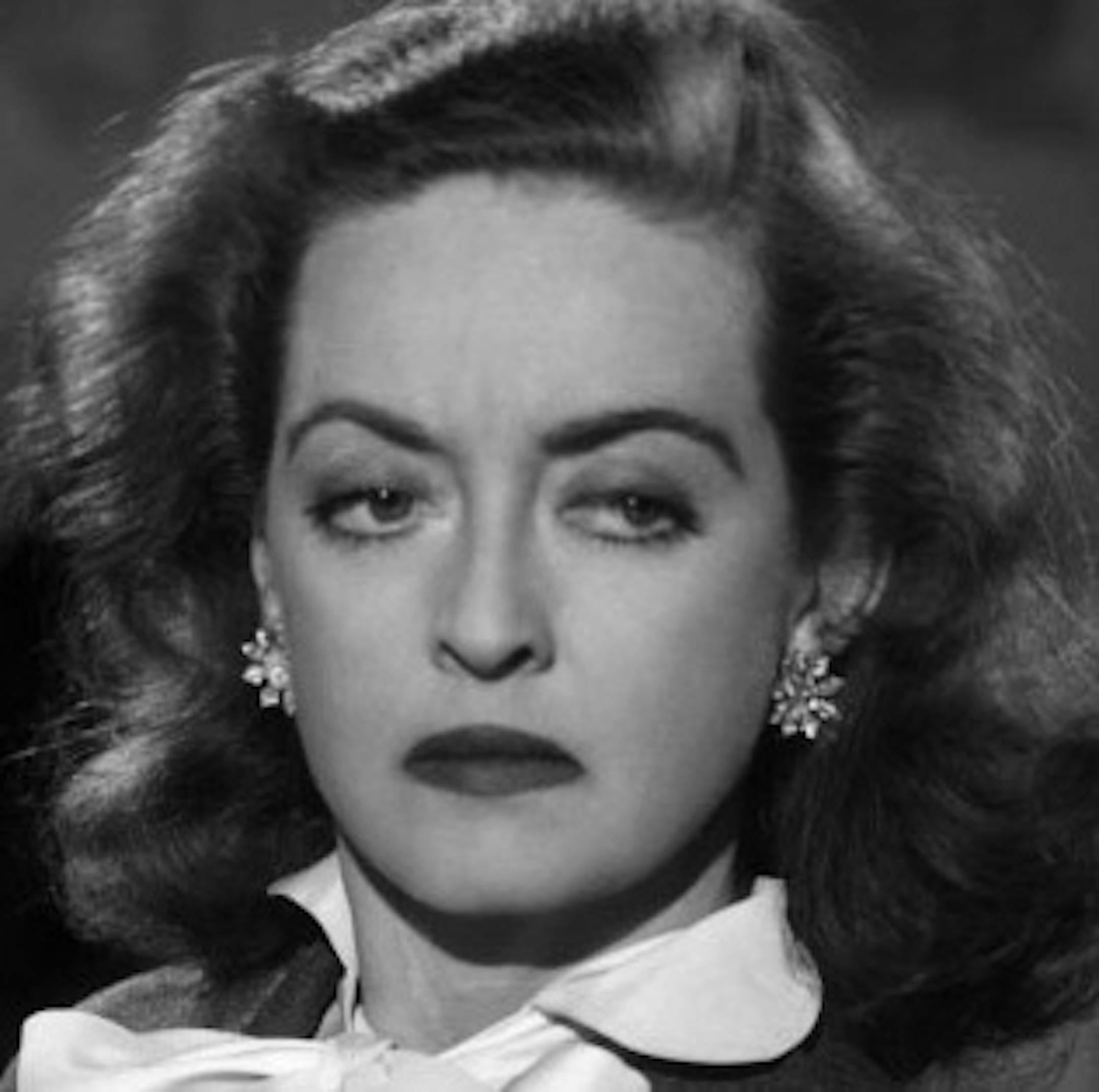 ALL ABOUT EVE / Bette Davis (right) is, for many women in the film business, "the best of the best." In the movie "All About Eve" she tussles with Gary Merrill (at left). // Gary Merrill tries to reassure Bette Davis in "All About Eve." // File photo.