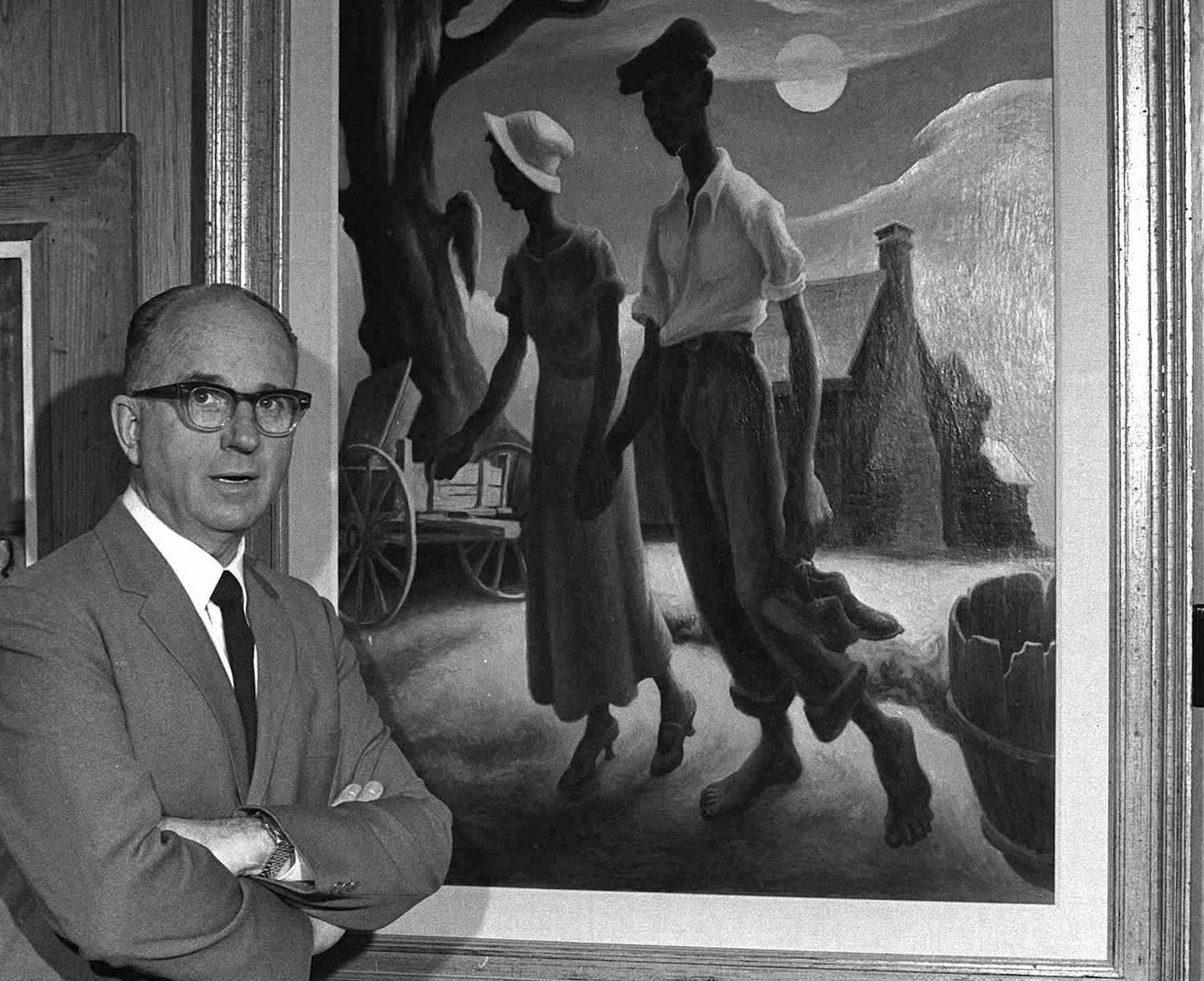 Author, James A. Michener, poses by one of his favorite paintings, "Romance " by Thomas Hart Benton, in the gallery in his home in 1965. (AP Photo) ORG XMIT: NY904