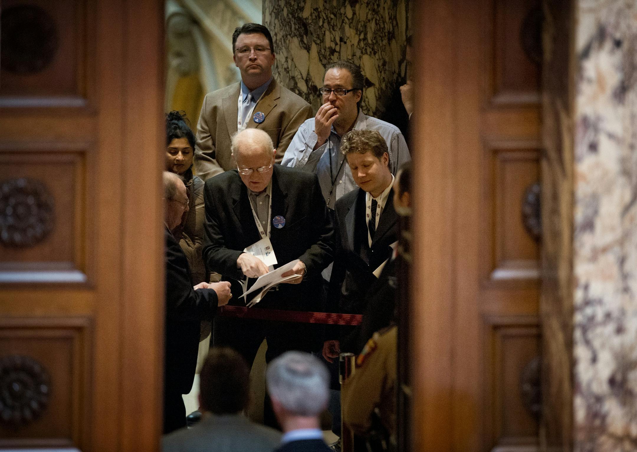 Members of a group of insurance agents and companies visiting the Capitol for the day to meet with legislators got a momentary look into the Senate chamber during debate of the health insurance exchange. Later a group of them got up and left the Senate gallery after an amendment they supported was defeated. The amendment would have prevented the health insurance exchange board from excluding insurance company plans even though they meet guidelines set up by the exchange. Thursday, March 7, 2013.