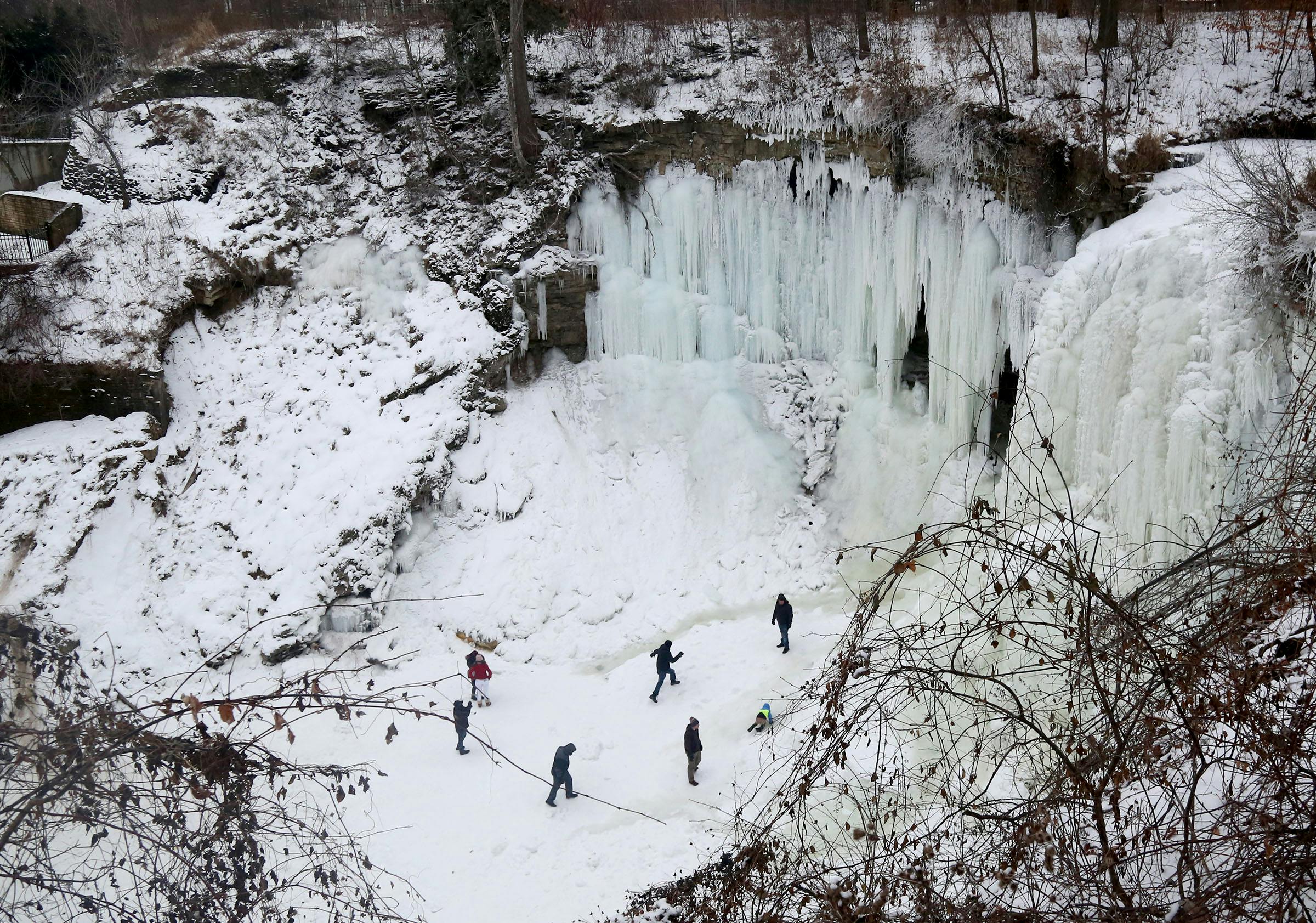 Fire crews rescue woman who fell in cave behind frozen Minnehaha Falls