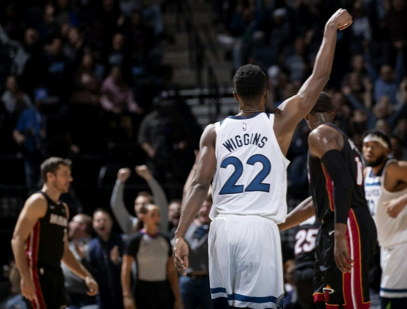 Wiggins celebrated his third straight three-pointer late in the fourth quarter.