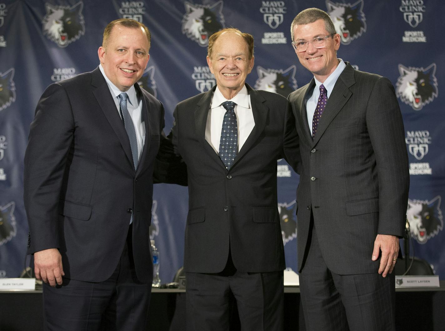 President of Basketball Operations and Head Coach Tom Thibodeau, owner Glen Taylor and General Manager Scott Layden posed for a photo at the end of a press conference at Target Center.