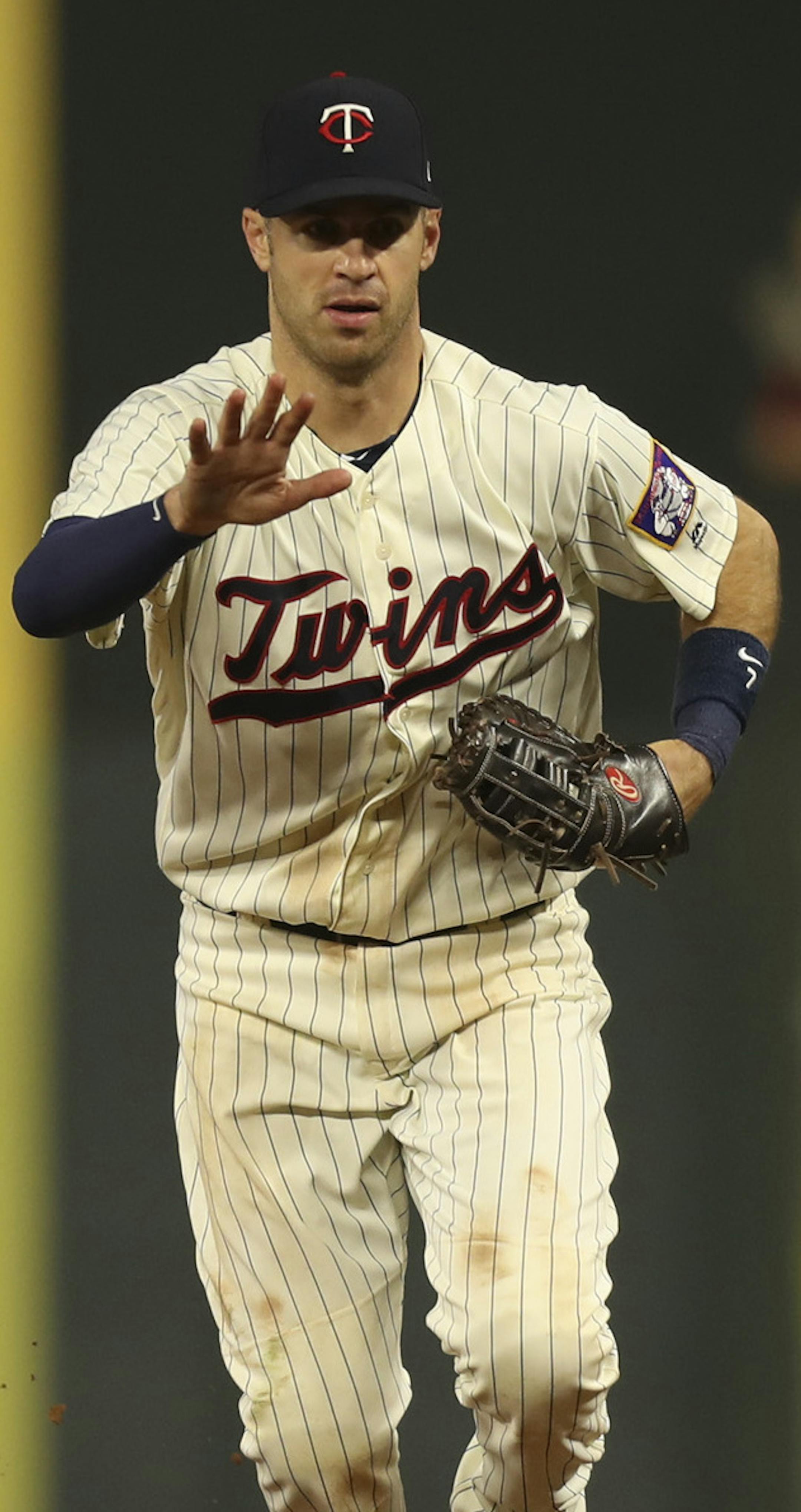 Twins first baseman Joe Mauer (7) called off Twins relief pitcher Ryan Pressly (57) after he fielded a grounder from White Sox third baseman Yolmer Sanchez (5) for an out in the eighth inning. ] JEFF WHEELER &#xef; jeff.wheeler@startribune.com The Minnesota Twins beat the Chicago White Sox 11-1 in an MLB baseball game Wednesday night, August 30, 2017 at Target Field in Minneapolis.