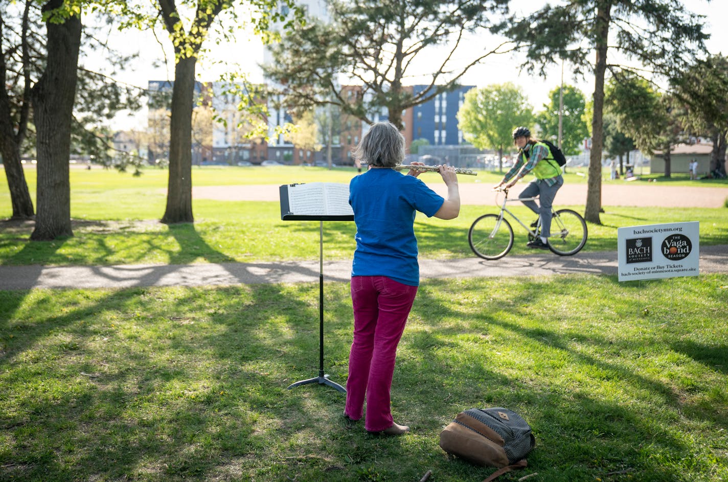 Flautist Julie Johnson played a 15 minute concert as part of the Bach Society of MinnesotaÕs Mobile Mini Concert Series at Van Cleve Park in Minneapolis, Minn., on Wednesday, May 12, 2021. The Bach Society of Minnesota is presenting a series of Mobile Mini-Concerts this week and next week. Musicians will be stopping by different parks throughout the Twin Cities playing 15 minute concerts from 5-8pm everyday and also 11am-2pm on weekends. ] RENEE JONES SCHNEIDER ¥ renee.jones@startribune.com