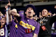 Minnesota Vikings fans Eric Klitzke of Blaine and Joe Hager of Ormsby reacted to announcement of the Vikings selecting Cordarrelle Patterson during th