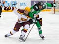 Jackson LaCombe of the Gophers tangled with North Dakota’s Matteo Costantini (18) during an early season game at 3M Arena at Mariucci. LaCombe’s t