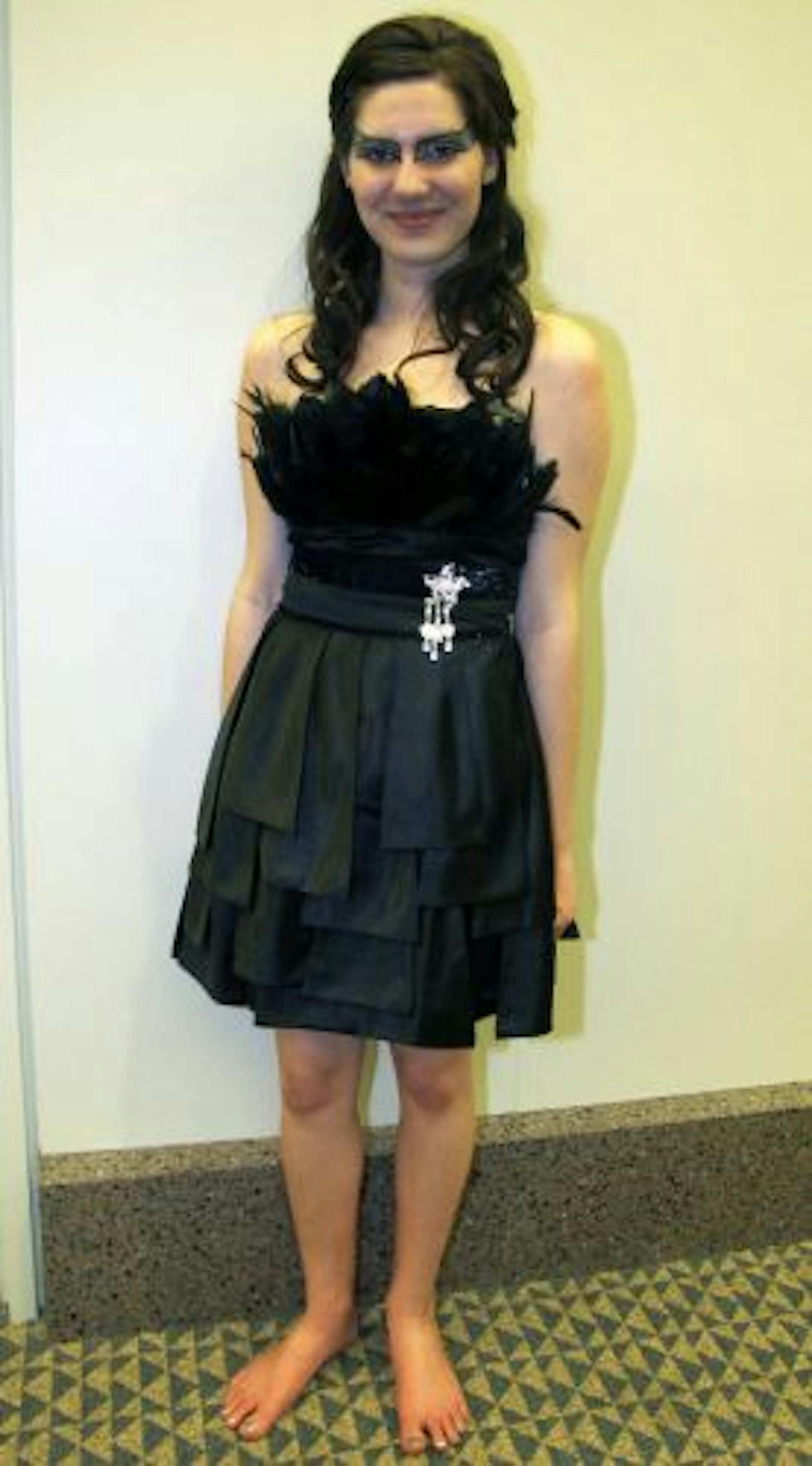 Sara Glassman, sglassman@startribune.comCoon Rapids High School's prom. Black SwanMegan Bender, seniorDress: $128 from uniquevintage.comWhy: �I was so inspired by the movie�s mysteriousness and the darkness and yet the elegance.� Makeup: It took her three hours to do it herself.