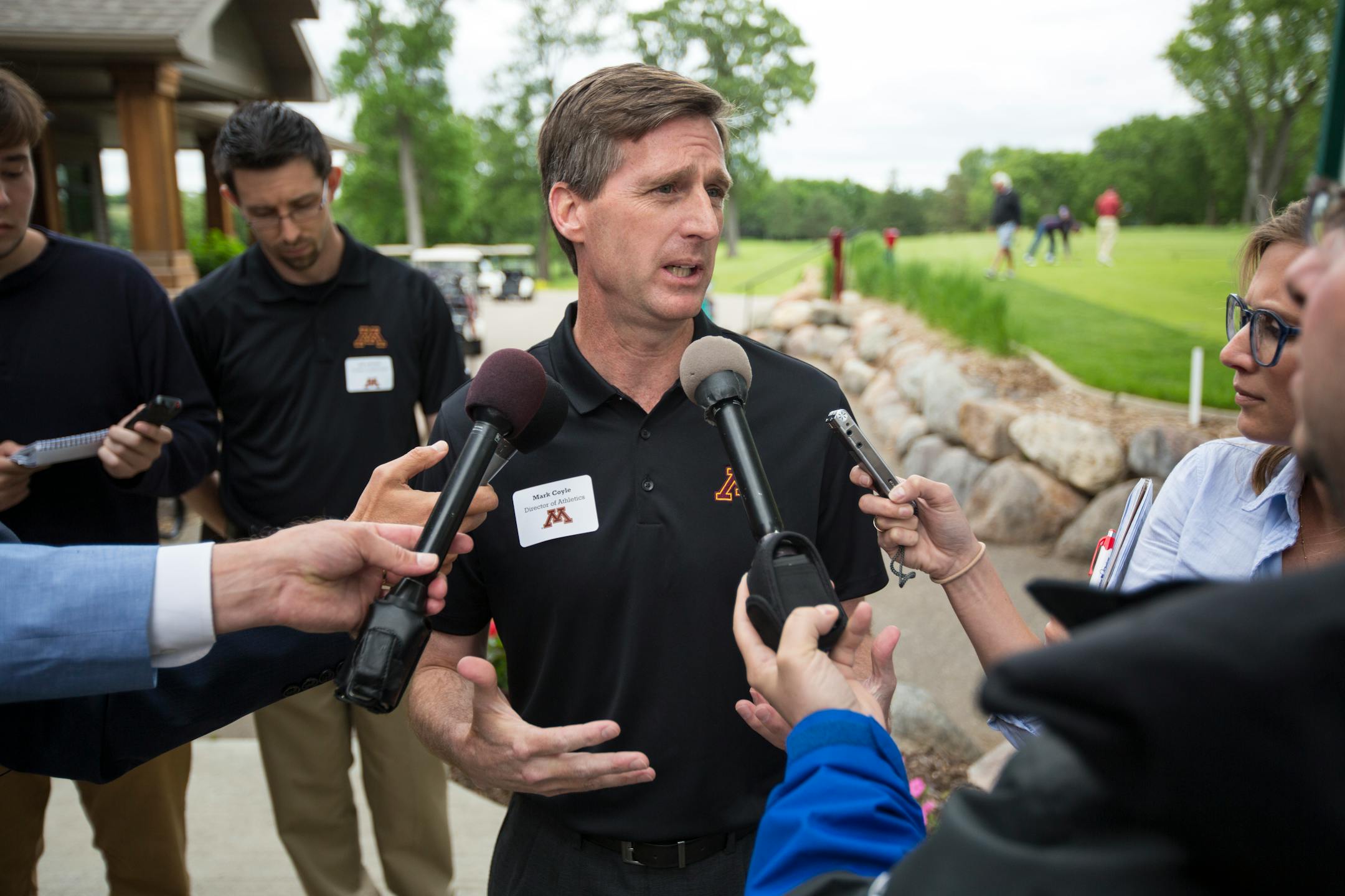 U of M athletic director Mark Coyle, on his second day on his new job, makes his first public appearance at the Crow River Country Club in Hutchinson, Minn. during their first stop of the Gopher Road Trip Chalk Talk. ] Hutchinson, MN - 06/01/2016