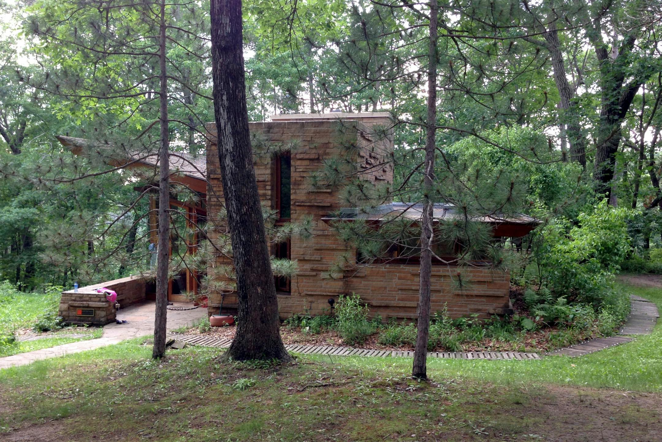 Designed by Frank Lloyd Wright in 1958, the Seth Peterson Cottage is tucked away in a heavily wooded corner of Mirror Lake State Park near Lake Delton, Wis. The cottage was fully restored in 1992 after decades of deterioration and is now open as a vacation rental.