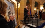 Sen. Tina Smith and Gov. Tim Walz applauded as former Gov. Mark Dayton's official Capitol portrait was unveiled during a ceremony Thursday.