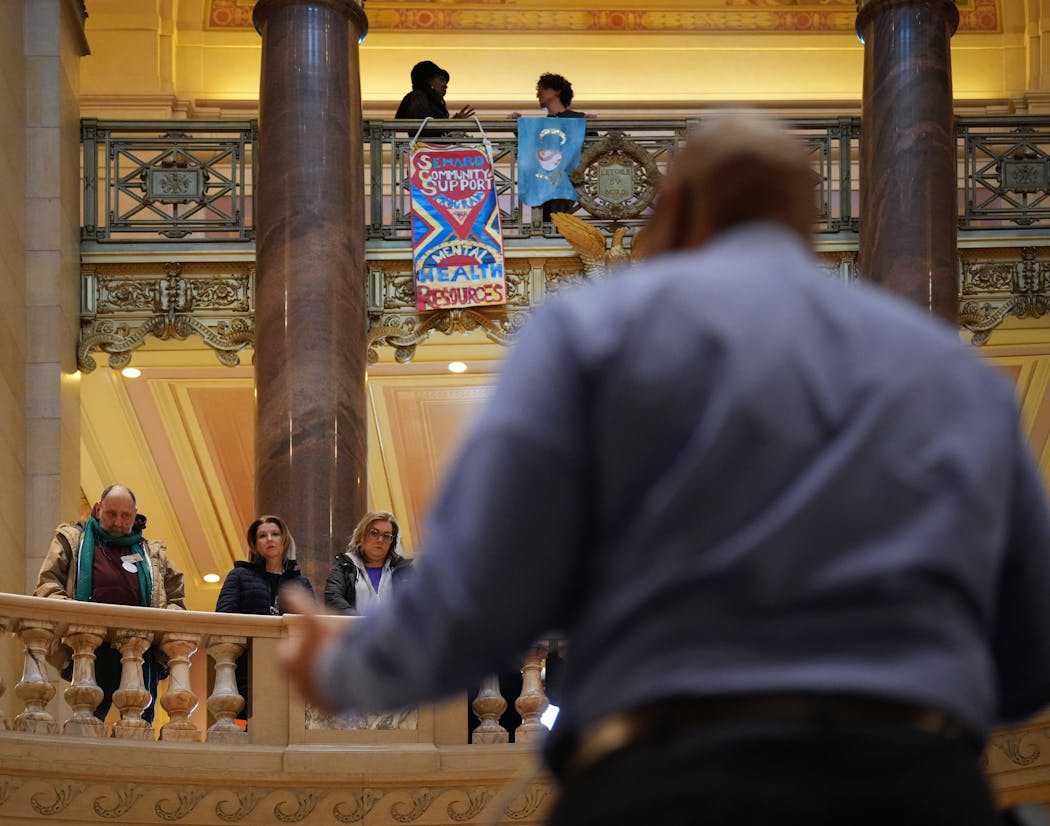 Supporters listen as Craig Warren, CEO of the Washburn Center, speaks at the Capitol on Thursday, March 9.