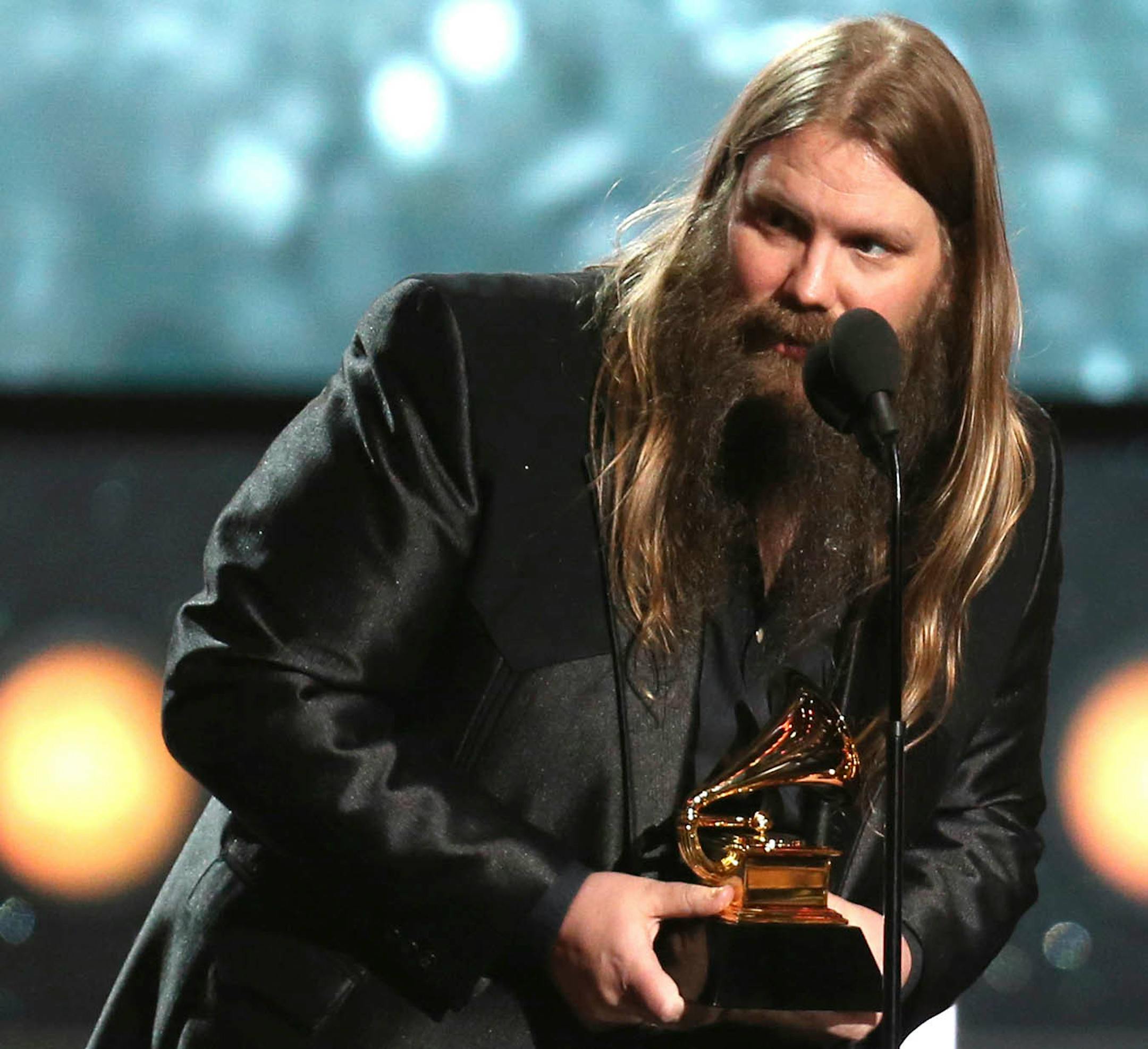 Chris Stapleton accepts the award for best country album for "From A Room: Volume 1" at the 60th annual Grammy Awards at Madison Square Garden on Sunday, Jan. 28, 2018, in New York.