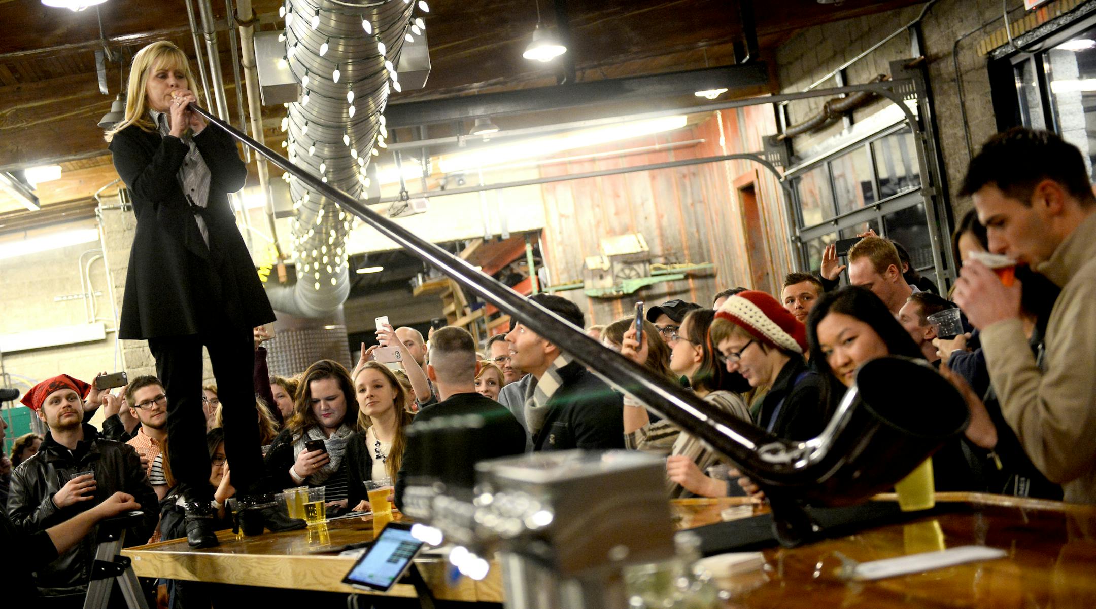 Ellen Dinwiddie Smith, a horn player with the Minnesota Orchestra, played “Amazing Grace” on a Swiss alphorn at Sociable Cider Werks in Minneapolis.