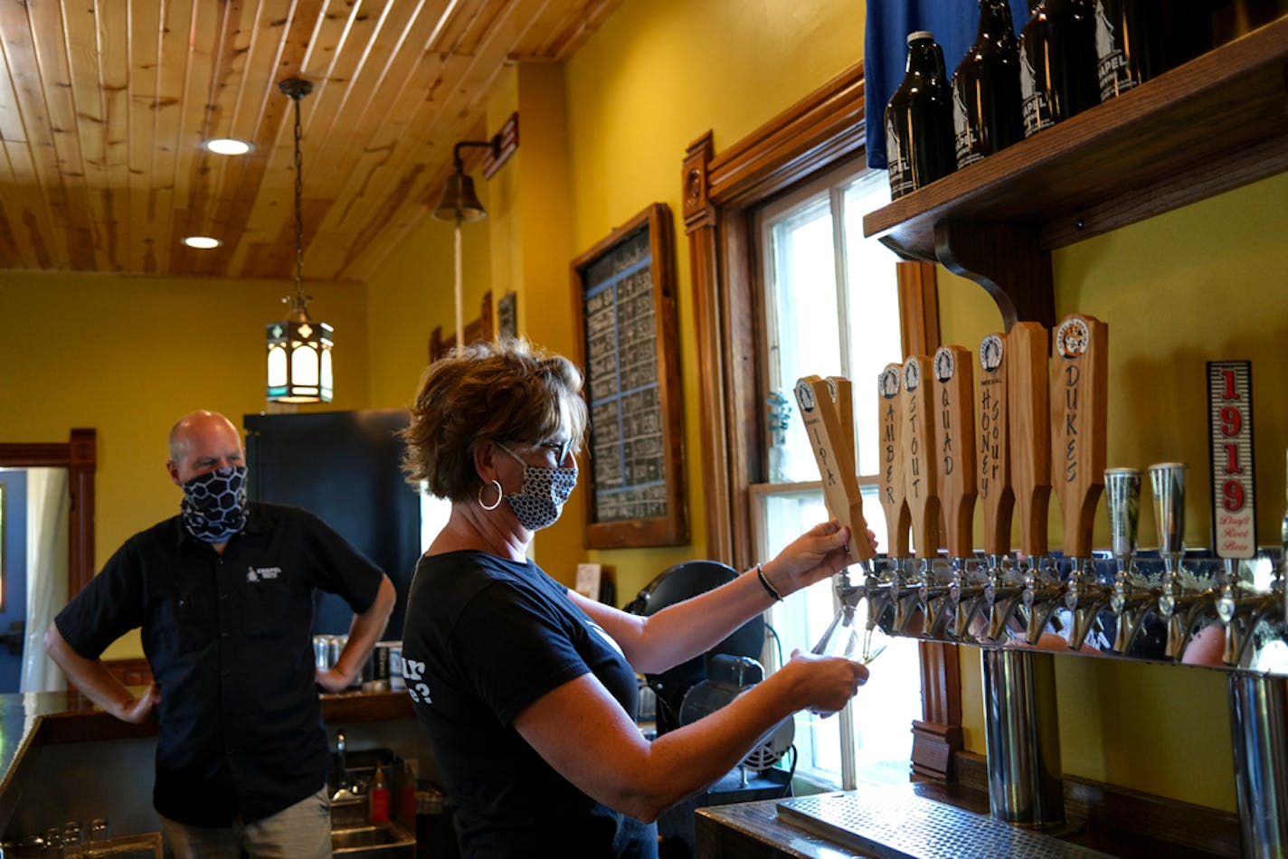 Chapel Brewing co-owner Tracie Vranich poured an IPA for a patron as fellow owner Steve Schmidt looked on Thursday afternoon.