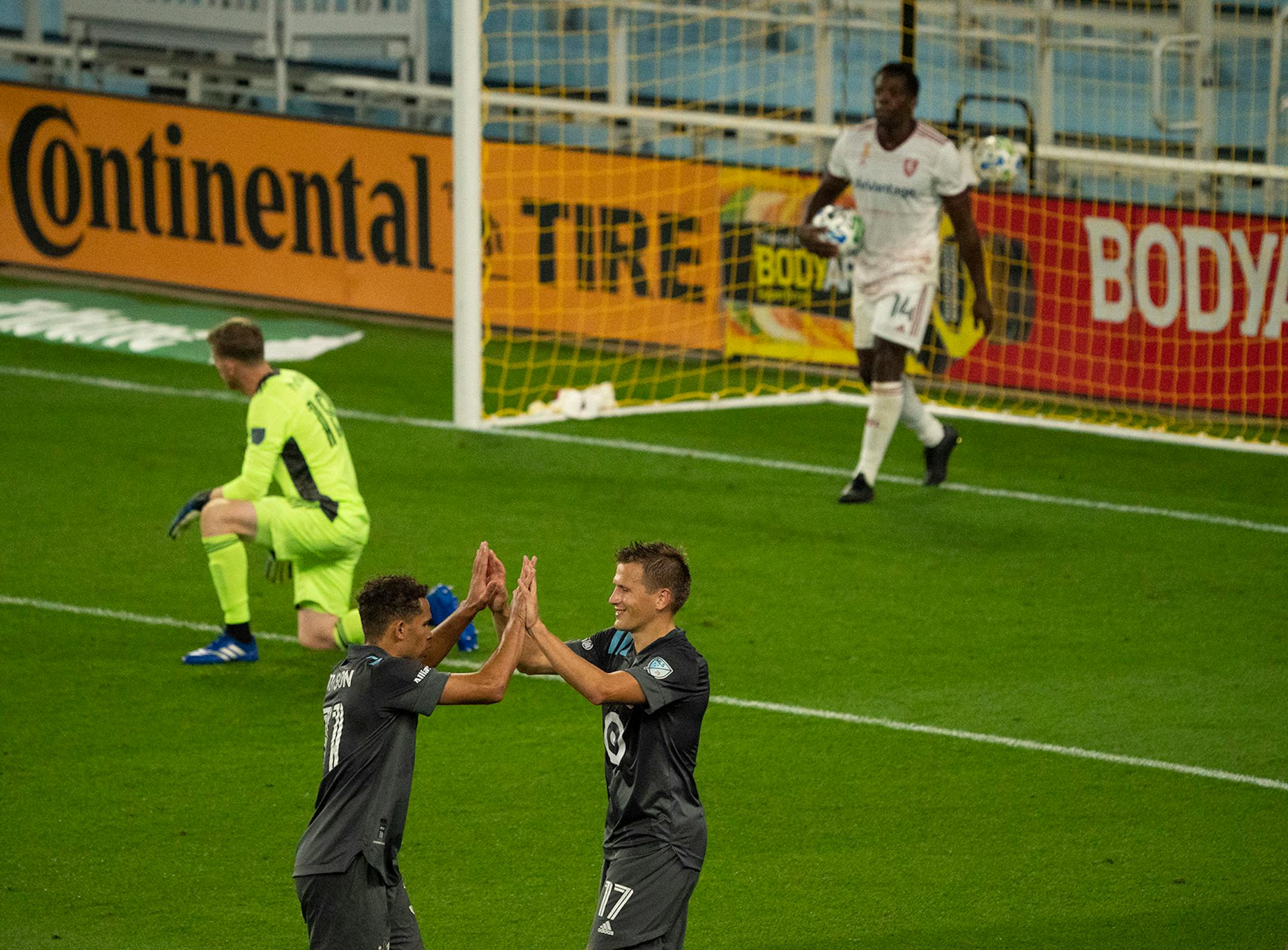 Minnesota United attacker Robin Lod (17) celebrated his second goal of the night with midfielder Hassani Dotson (31) in the second half.