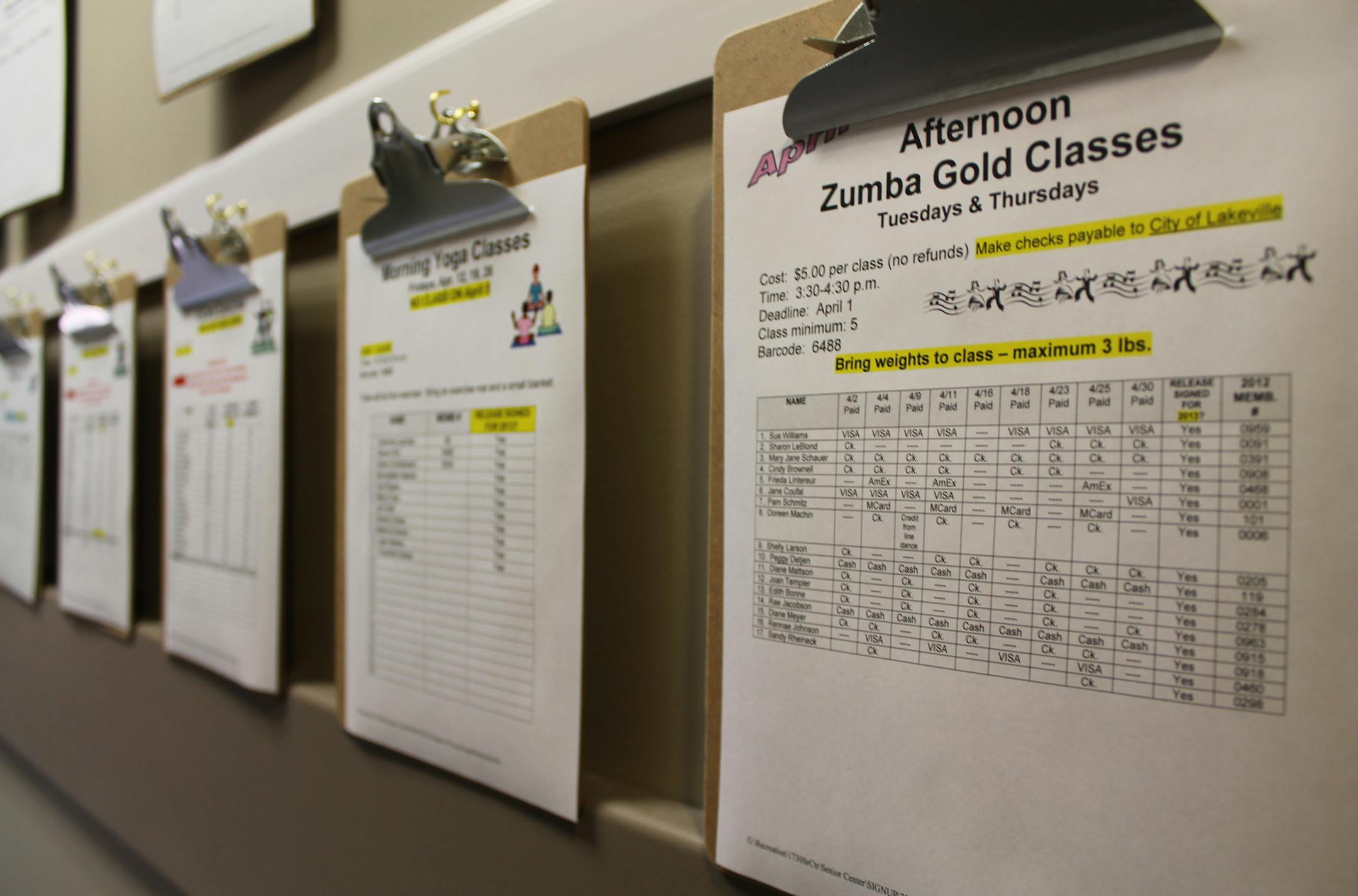 By LIALA HELAL Clipboards line the walls of the Lakeville Senior Center for signing up for more than 200 programs each month. April 16, 2013.