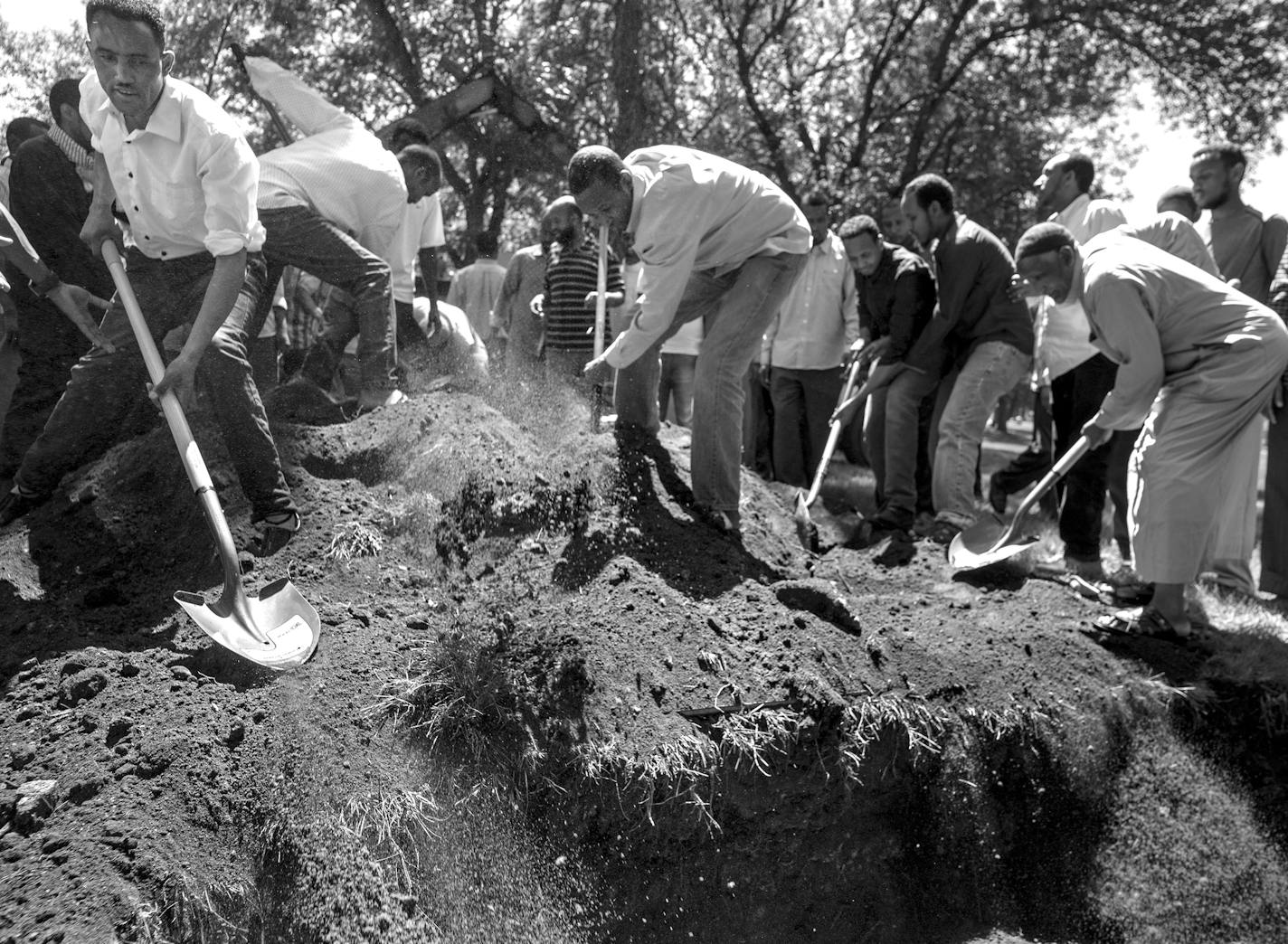 Ahmed Ashi was laid to rest according to Islamic custom not far from the grave of his childhood friend Idris Hussein.[In Willmar where Ahmed Ashi, 11 who drowned along with childhood friend Idris Hussein,11, the community came together to lay the boys to rest.Richard Tsong-Taatarii/rtsong-taatarii@startribune.com ORG XMIT: MIN1606291628000362