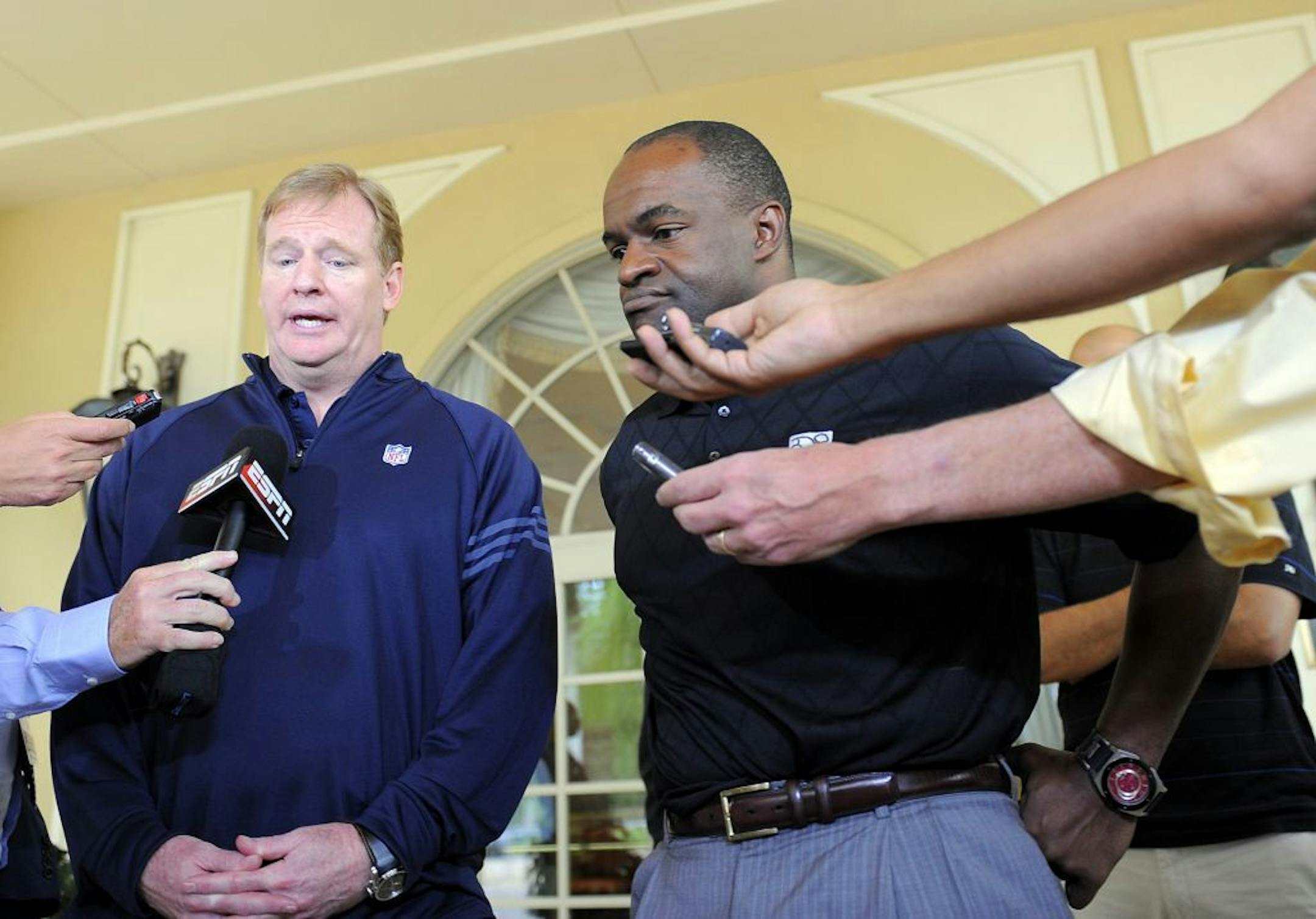 NFL Commissioner Roger Goodell, left, and National Football League Players Association executive director DeMaurice Smith are the key players in the labor dispute.