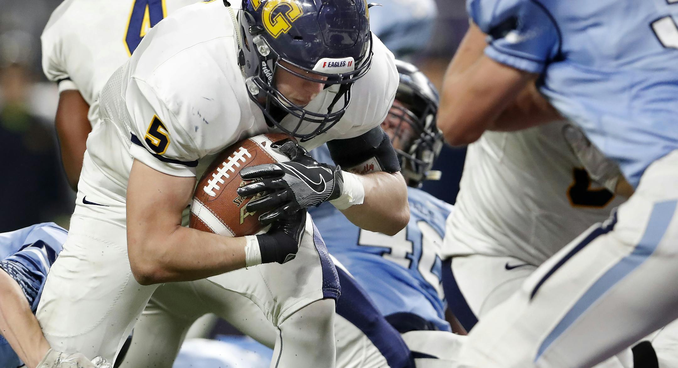 Ivan Burlak (5) of Totino-Grace ran in for a 2-yard touchdown in the second quarter. ] CARLOS GONZALEZ cgonzalez@startribune.com - November 17, 2016, Minneapolis, MN, US Bank Stadium, Prep Bowl / High School Football Class 6A semifinals Blaine vs. Totino-Grace