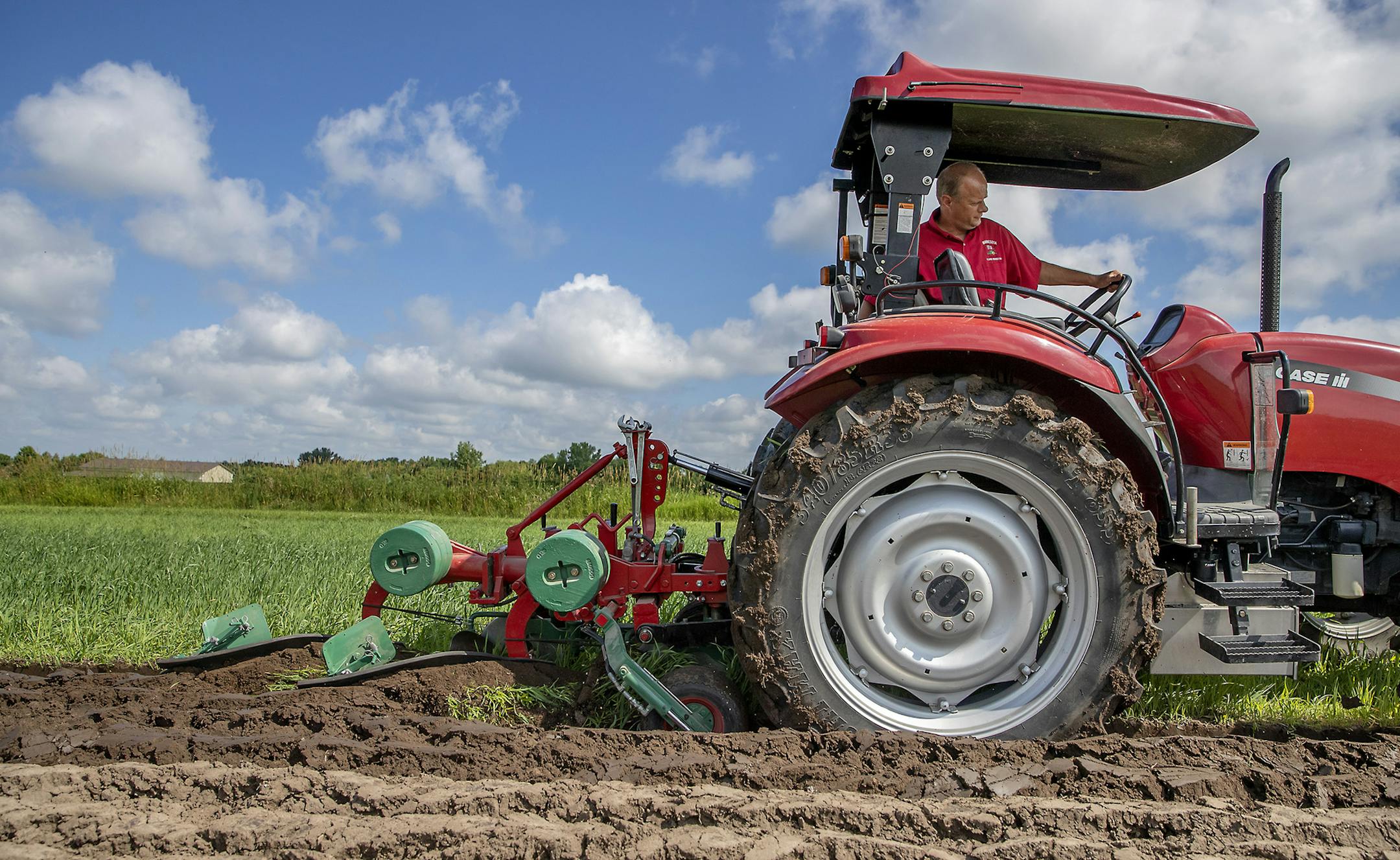 Gene Gruber practiced on a field to perfect his plowing skills, Thursday, July 11, 2019 in Richmond, MN. Gruber of Stearns County will be competing this year in the World Ploughing Championship, to be held in Baudette, Minn., over the Labor Day weekend. As many as 10,000 people from dozens of nations are expected to descend on the tiny border town; every hotel room for 100 miles is booked. ] ELIZABETH FLORES • liz.flores@startribune.com
