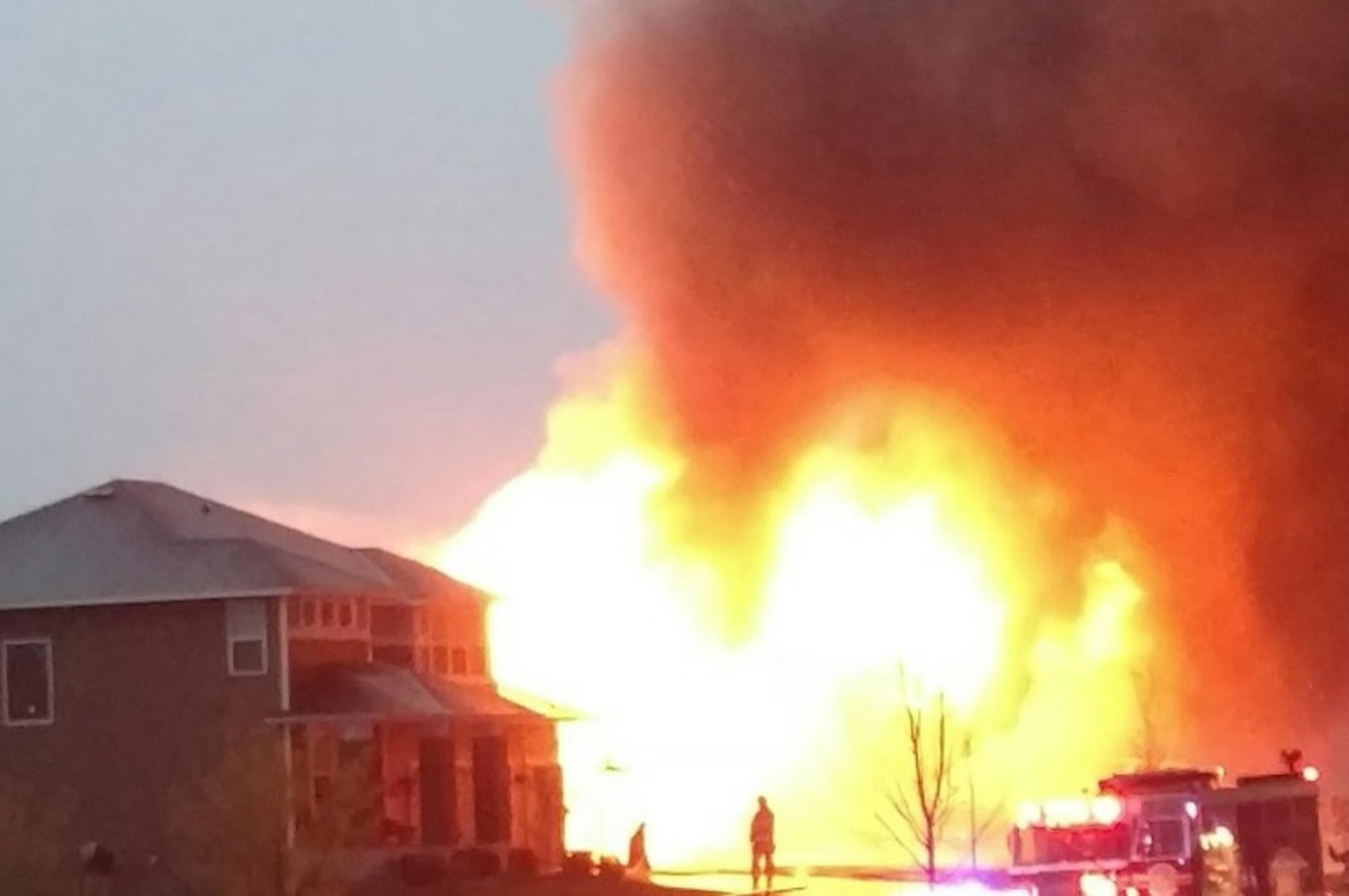 Fire destroyed two homes in a block in Otsego and damaged another.