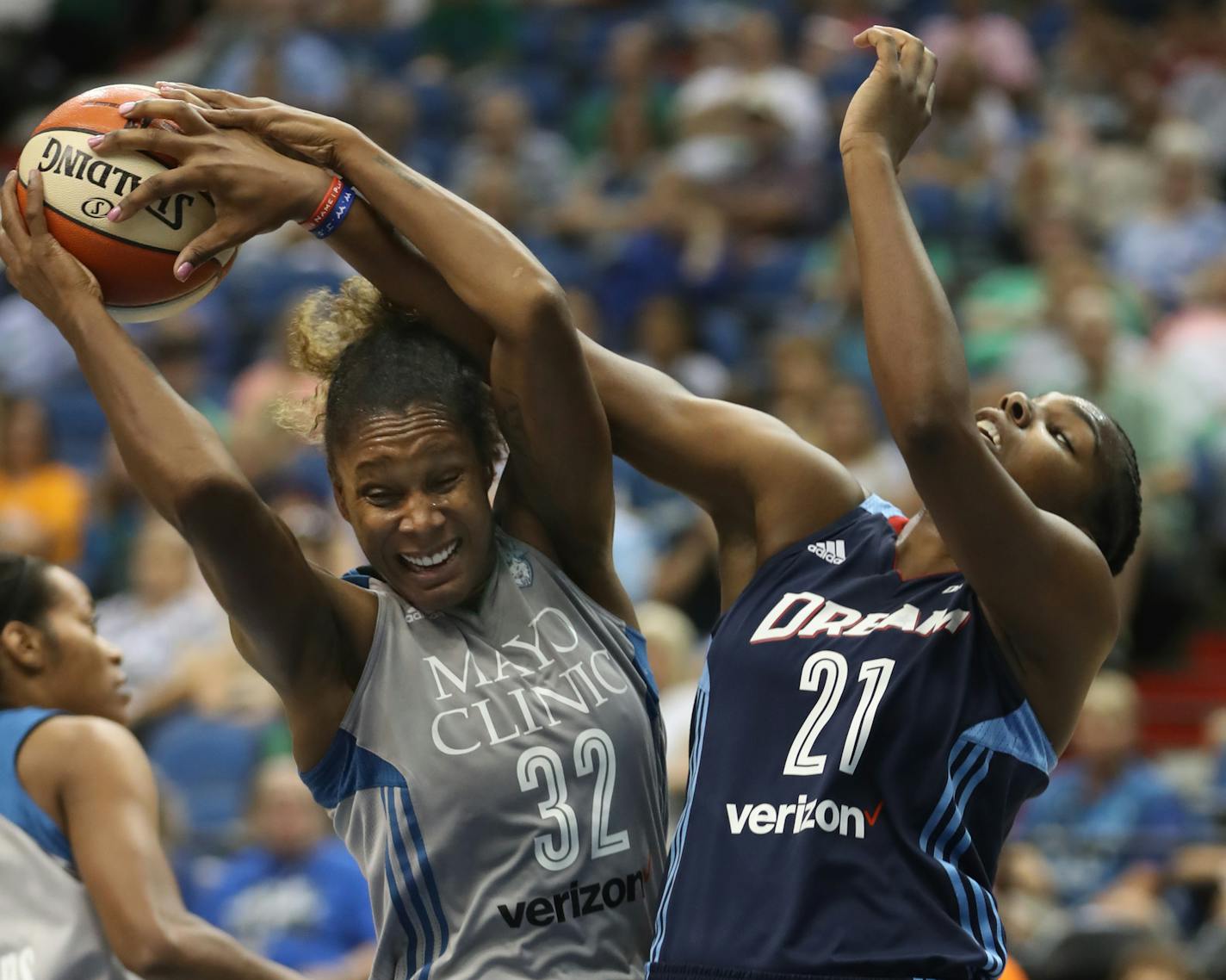 Rebekkah Brunson(32) gets tangled with Reshanda Gray(21) of the Dream.]The Lynx play the Dream at Target Center in a WNBA game.Richard Tsong-taatarii@startribune.com