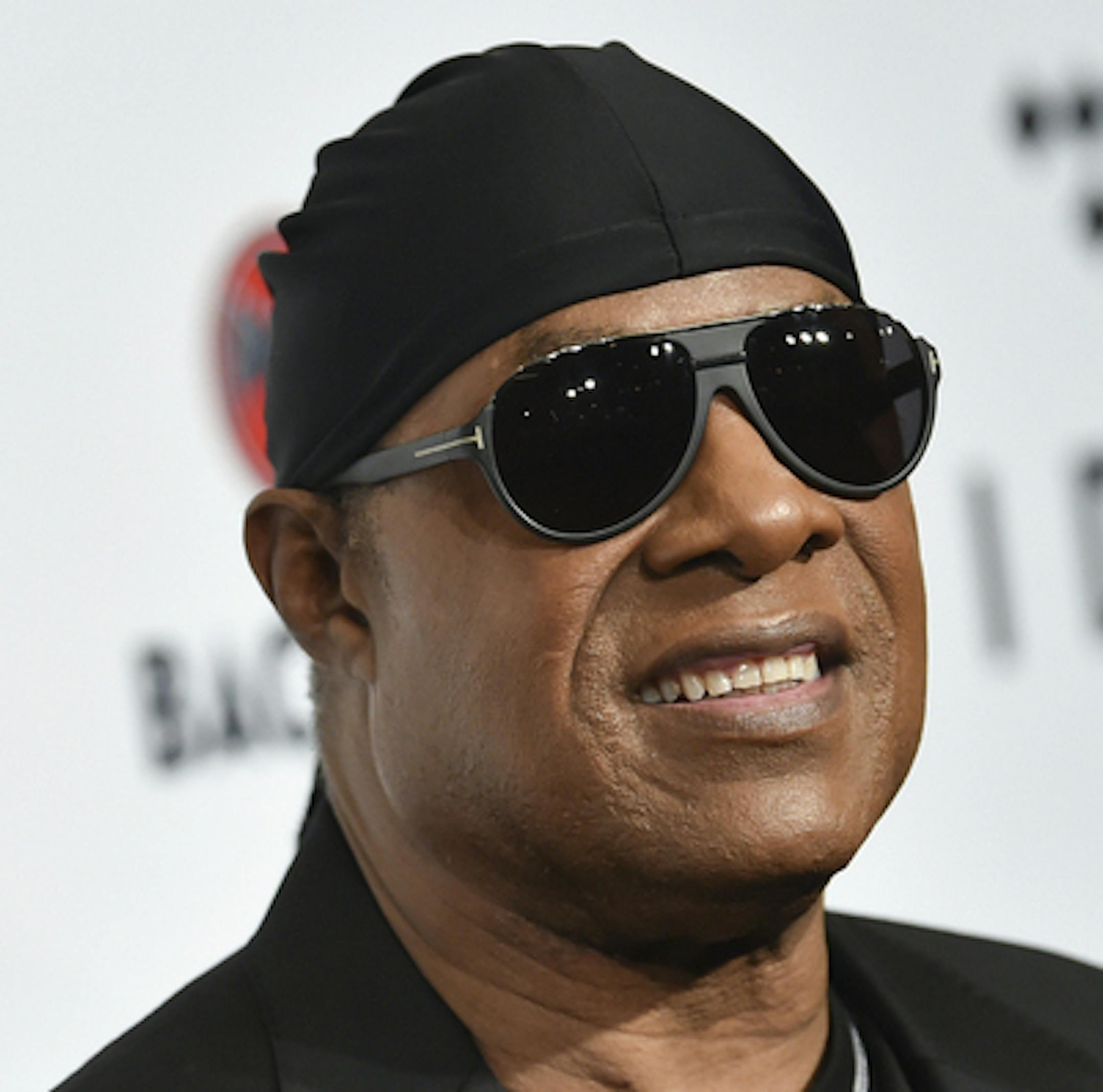 FILE - In this Oct. 17, 2017, file photo, Stevie Wonder attends the TIDAL X: Brooklyn 3rd Annual Benefit Concert in New York. Wonder released two new songs Tuesday reflecting the current times that he hopes inspires change. The music icon dropped the tracks "Where Is Our Love Song" and "Can't Put It In the Hands of Fate," which he also announced would be released through his new label, So What the Fuss Music, distributed through Universal Music Group's Republic Records. (Photo by Evan Agostini/I