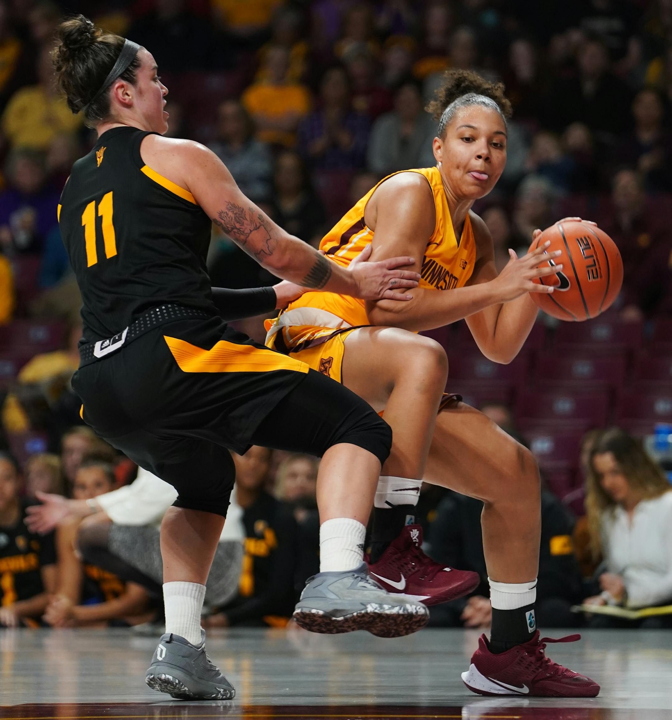 Gophers Destiny Pitts (3) drives against Robby Ryan (11) . ] Game coverage from Arizona State at Gophers. RICHARD TSONG-TAATARII ¥ richard.tsong-taatarii@startribune.com