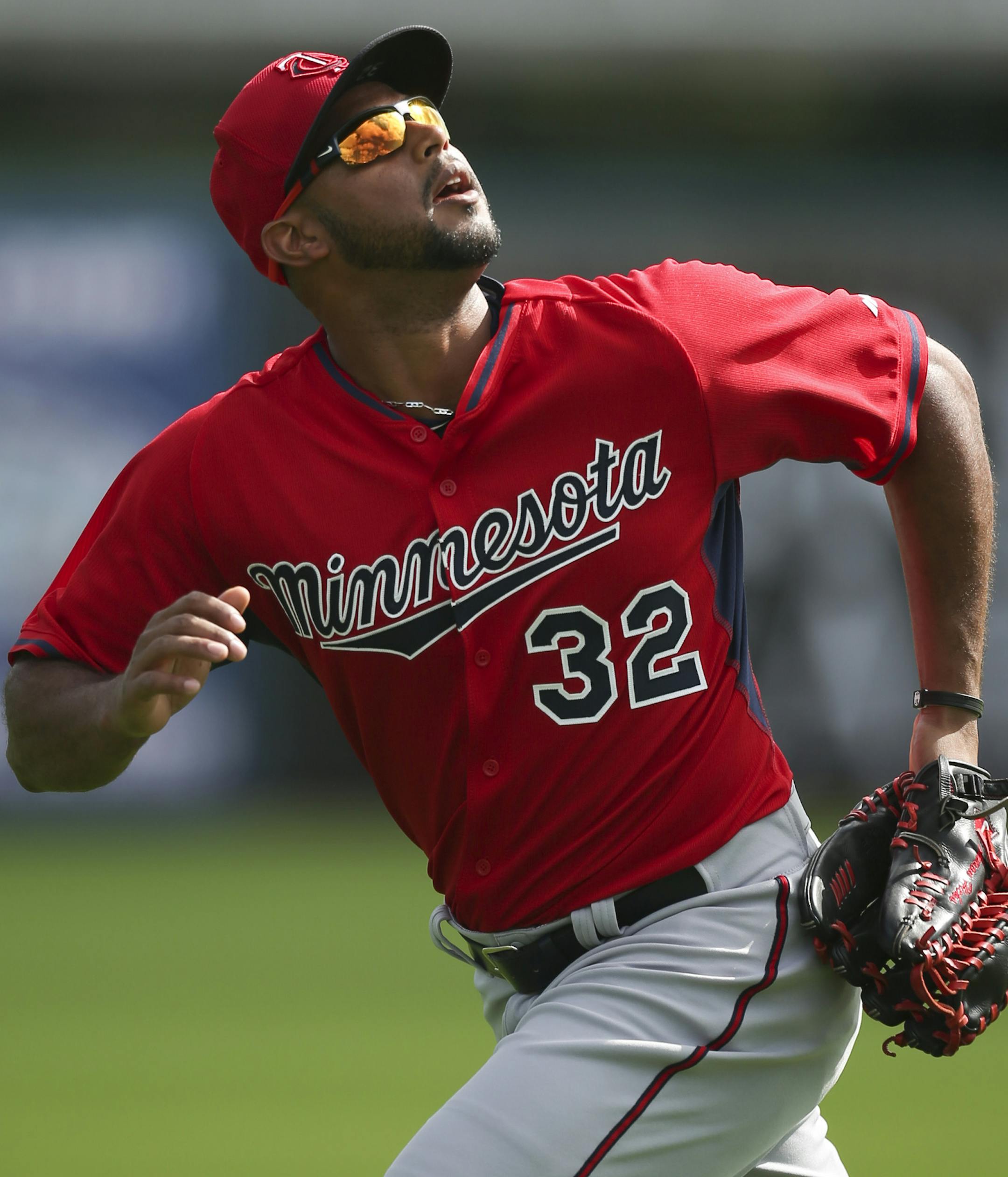 Minnesota Twins center fielder Aaron Hicks tracked a fly ball during a workout for outfielders Monday morning at Hammond Stadium. ] JEFF WHEELER &#xef; jeff.wheeler@startribune.com The entire Twins squad worked out again Monday morning, March 2, 2015, at spring training in Fort Myers, FL.