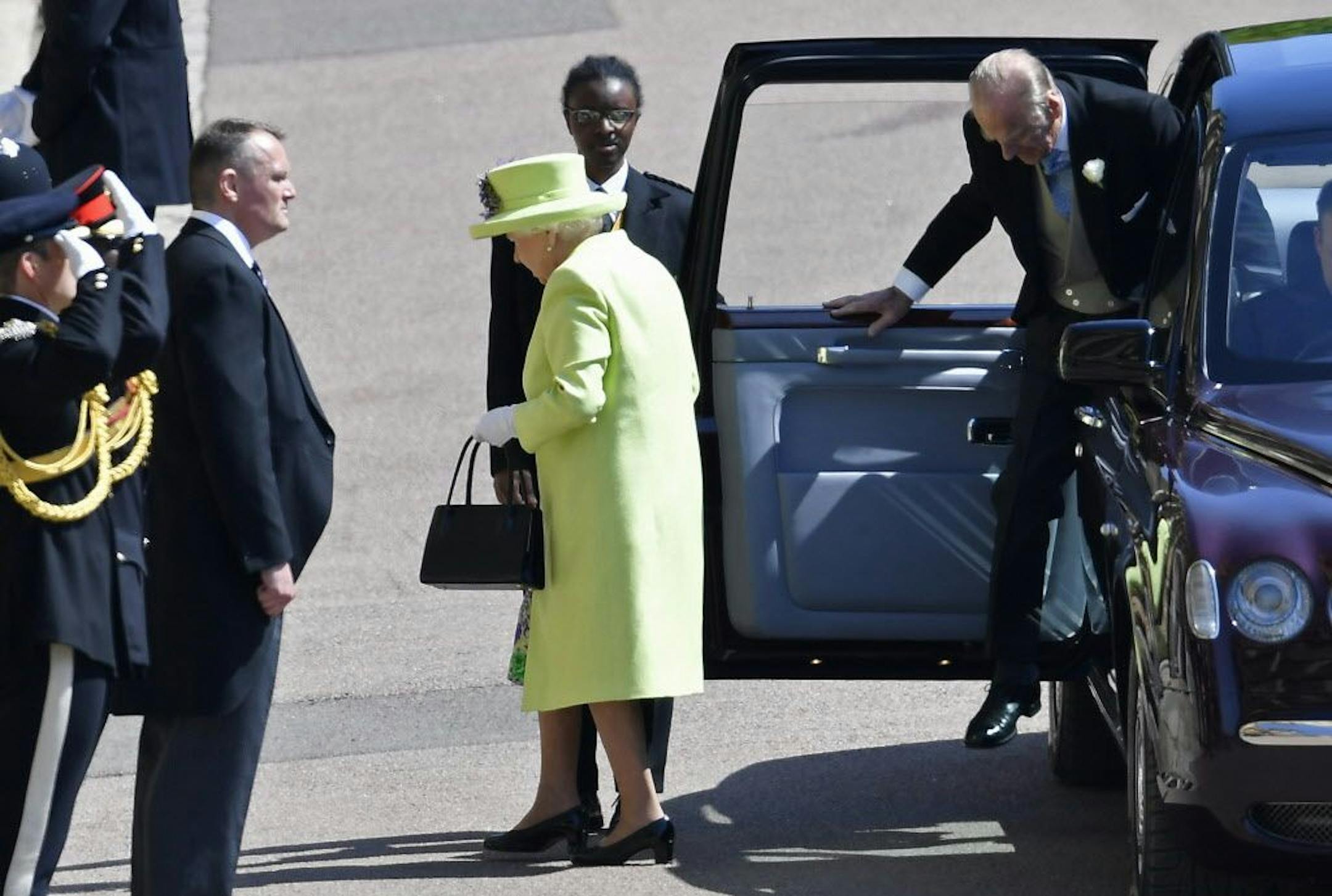 Britain's Queen Elizabeth and Prince Philip arrive for the wedding ceremony of Prince Harry and Meghan Markle at St. George's Chapel in Windsor Castle in Windsor, near London, England, Saturday, May 19, 2018.
