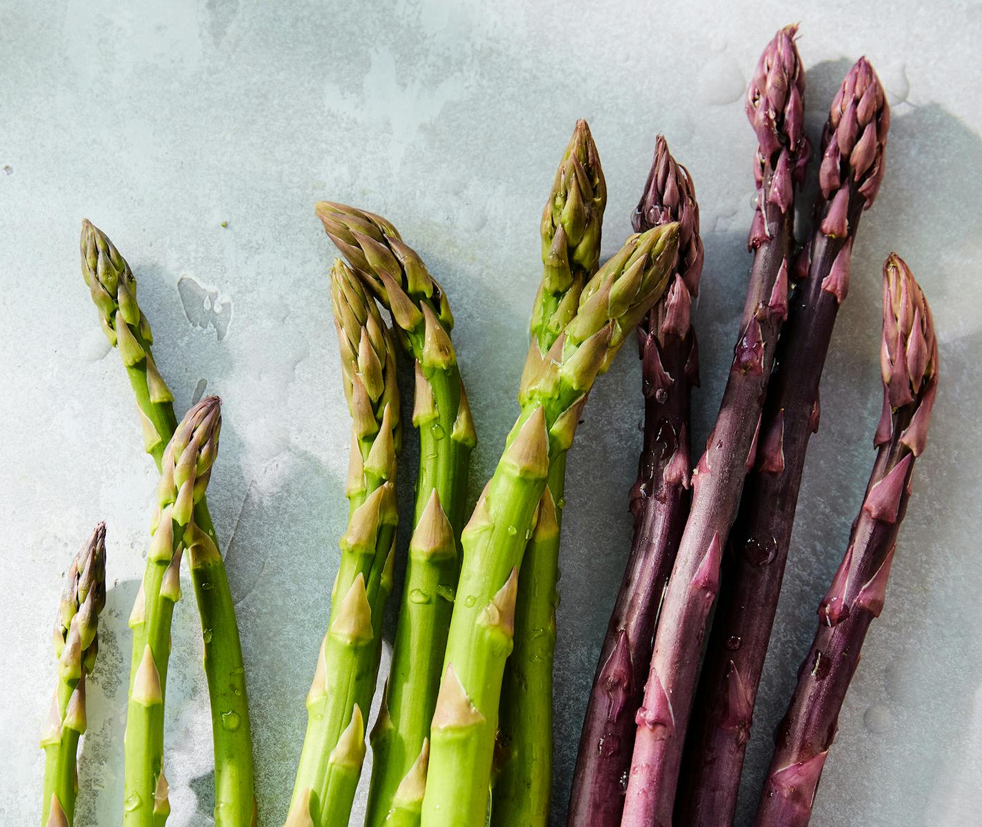 Asparagus in New York, May 4, 2023. Put those gorgeous stalks to work in a creamy pasta, a filling grain bowl and a bright, beautiful soup from Melissa Clark. Food styled by Maggie Ruggiero. (Ryan Liebe/The New York Times)