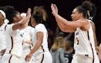 Gophers guard Jasmine Powell (4) celebrated with Destiny Pitts (3) during a game against Montana State in November. "Best teammate you could ever ask 