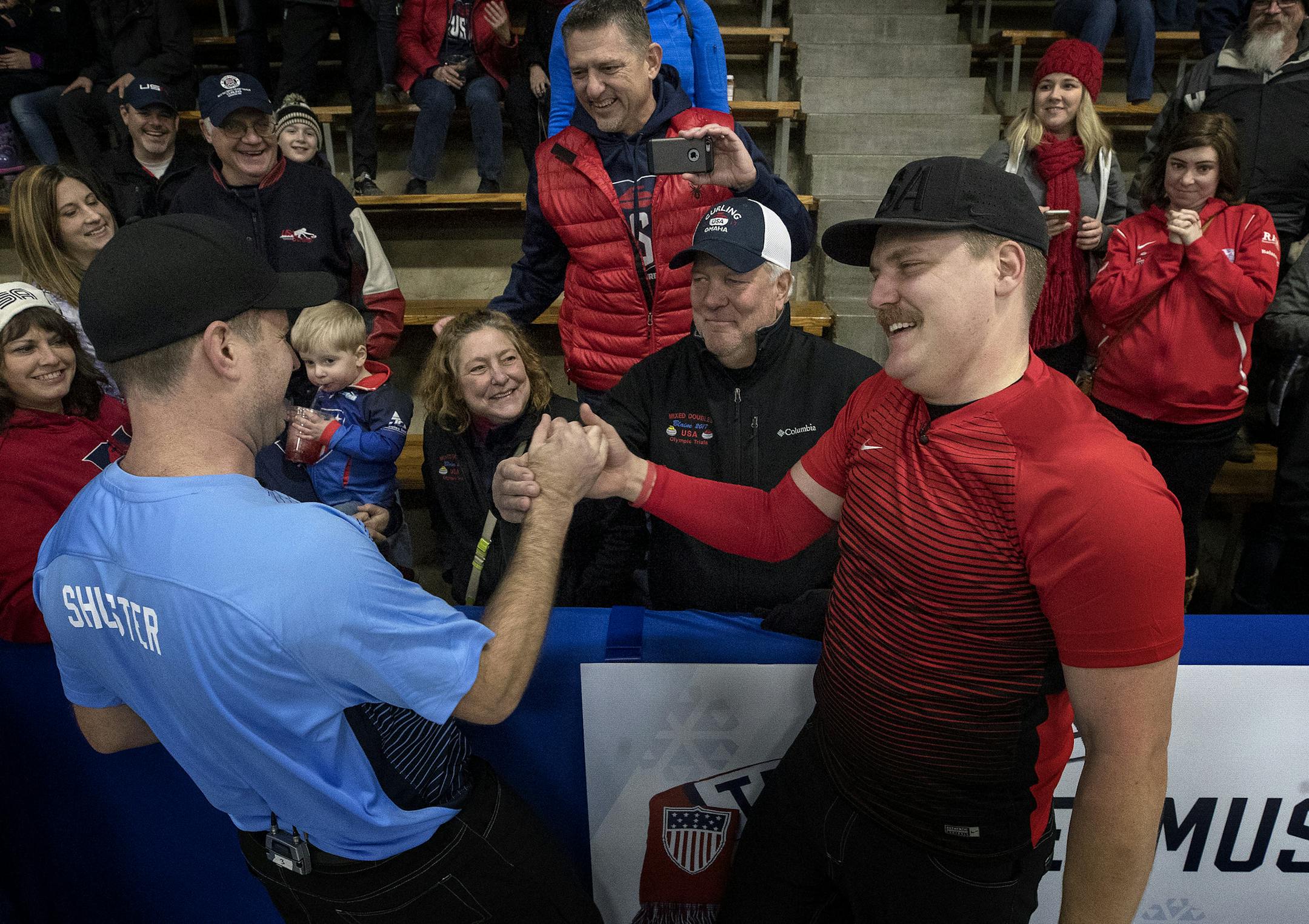 Matt Hamilton was congratulated by John Shuster.