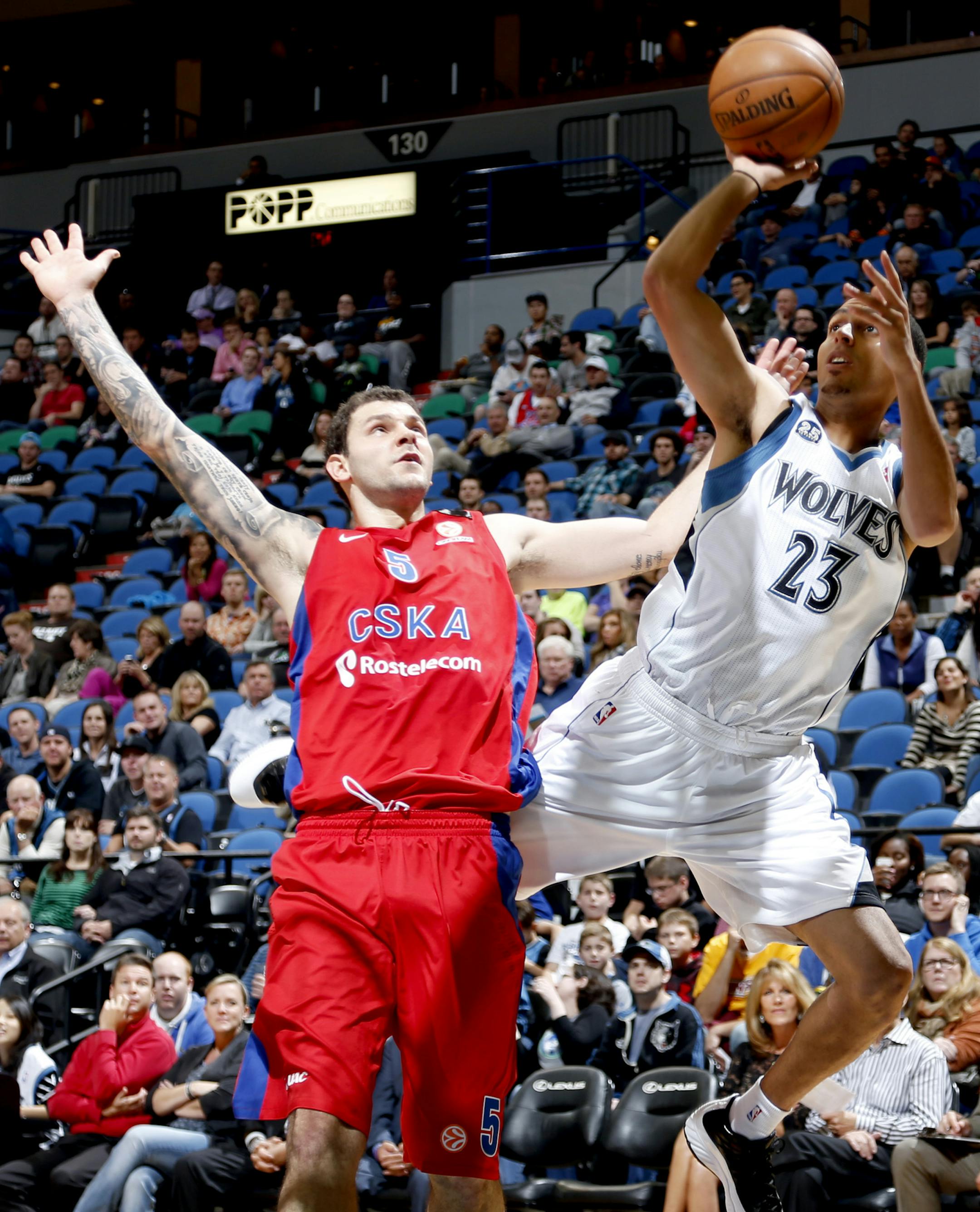 Kevin Martin (23) attempted a shot while being defended by Vladimir Micov (5) in the second quarter. ] CARLOS GONZALEZ cgonzalez@startribune.com October 7, 2013, Minneapolis, Minn., Target Center, NBA, Minnesota Timberwolves vs. CSKA Moscow - exhibition game