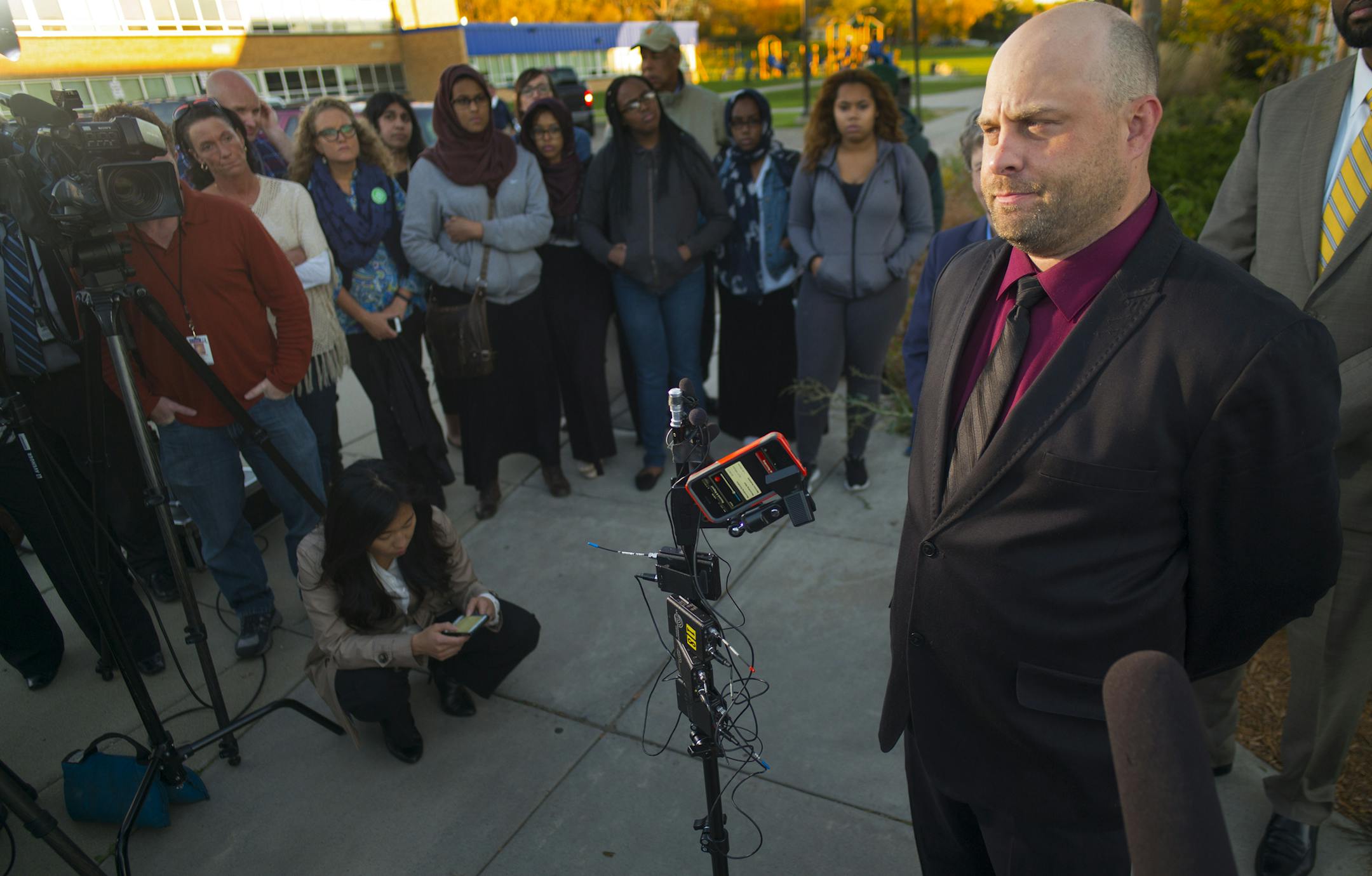 At Columbia Heights District Center, Grant Nichols, far right discussed why he was resigning after the furor for an offensive comment against Muslims was posted on his Facebook page. ] Richard Tsong-Taatarii/rtsong-taatarii@startribune.com