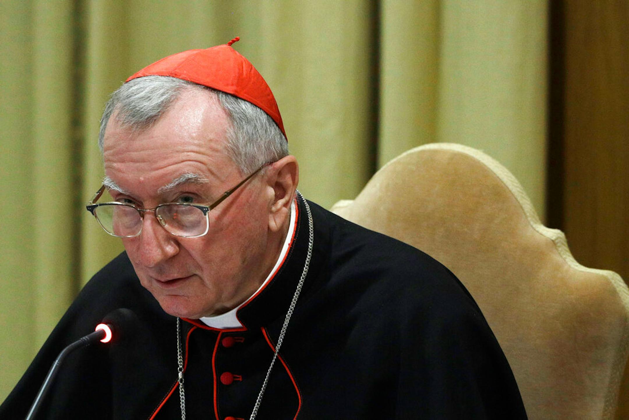 Vatican Secretary of State Cardinal Pietro Parolin talks to journalists during a press conference to present the full text of the new Pope Francis encyclical "All Brothers" at the Vatican, Sunday, Oct. 4, 2020. (AP Photo/Gregorio Borgia)