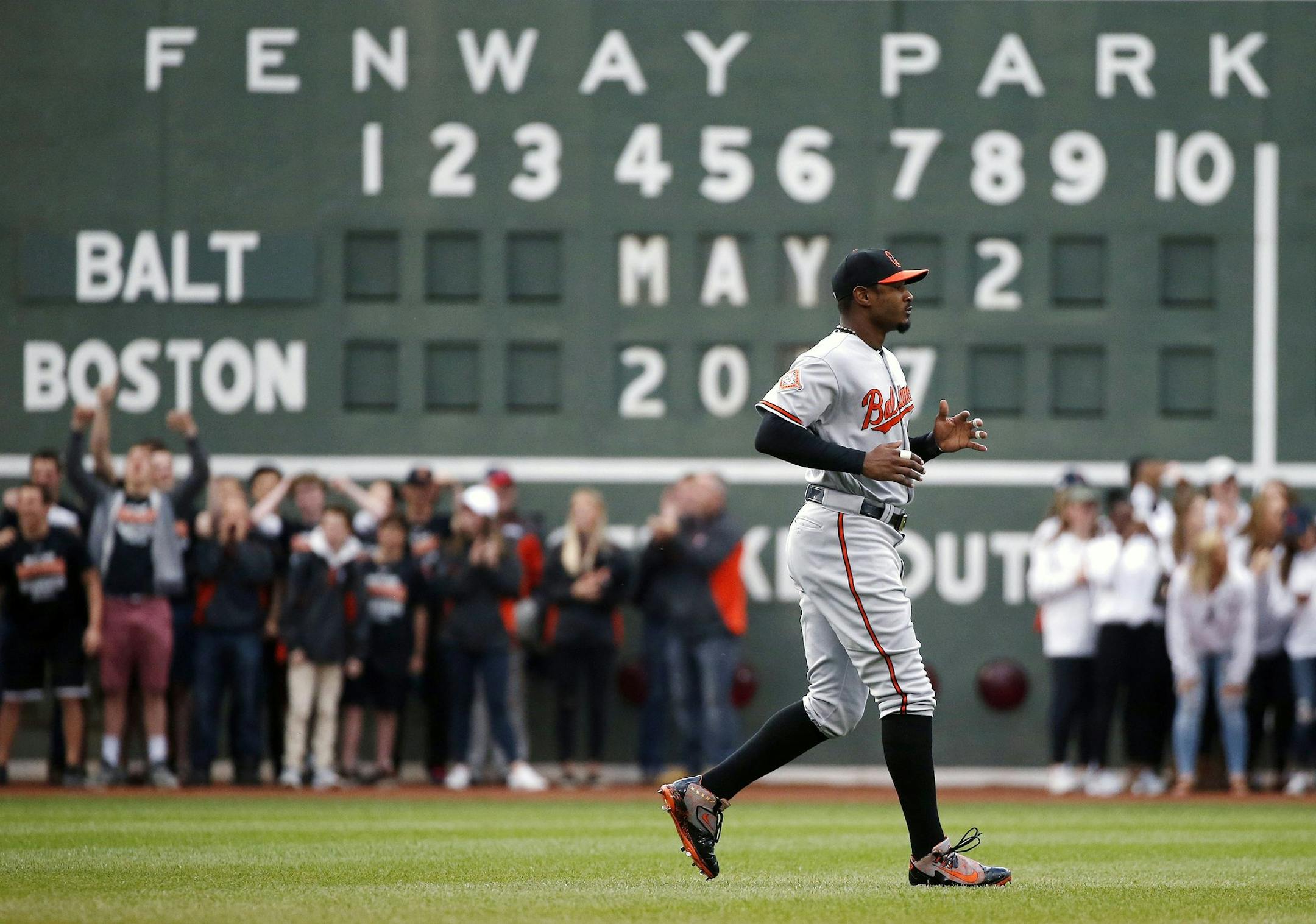 Baltimore Orioles' Adam Jones warms up before a baseball game against the Boston Red Sox, Tuesday, May 2, 2017, in Boston. Jones called the incident in which he said fans inside Fenway Park yelled racial slurs at him and threw a bag of peanuts in his direction was "unfortunate," with no place in today's game. Jones called the incident in which he said fans inside Fenway Park yelled racial slurs at him and threw a bag of peanuts in his direction was "unfortunate," with no place in today's game. R