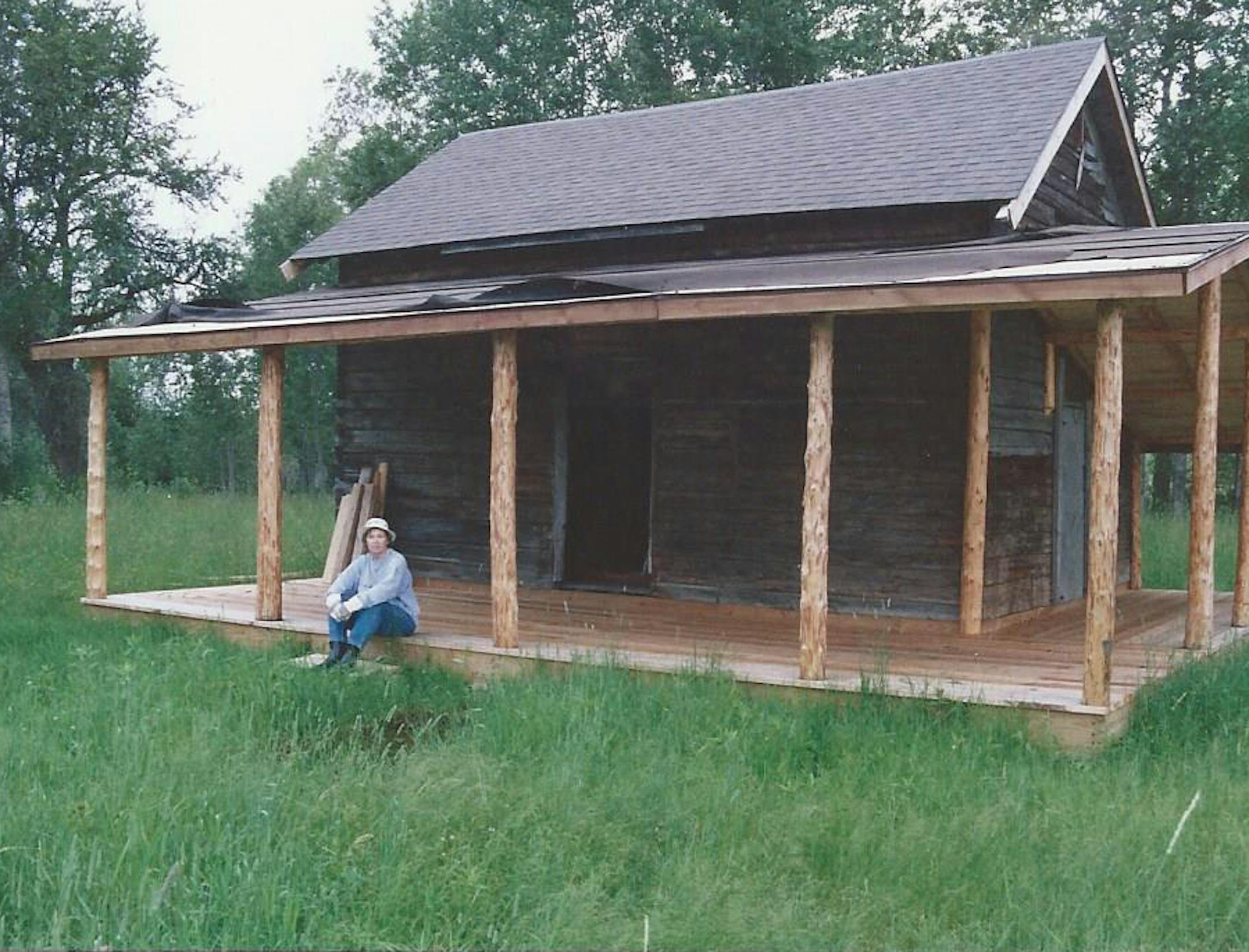 Dolores on the porch of Ullstrom cabin.